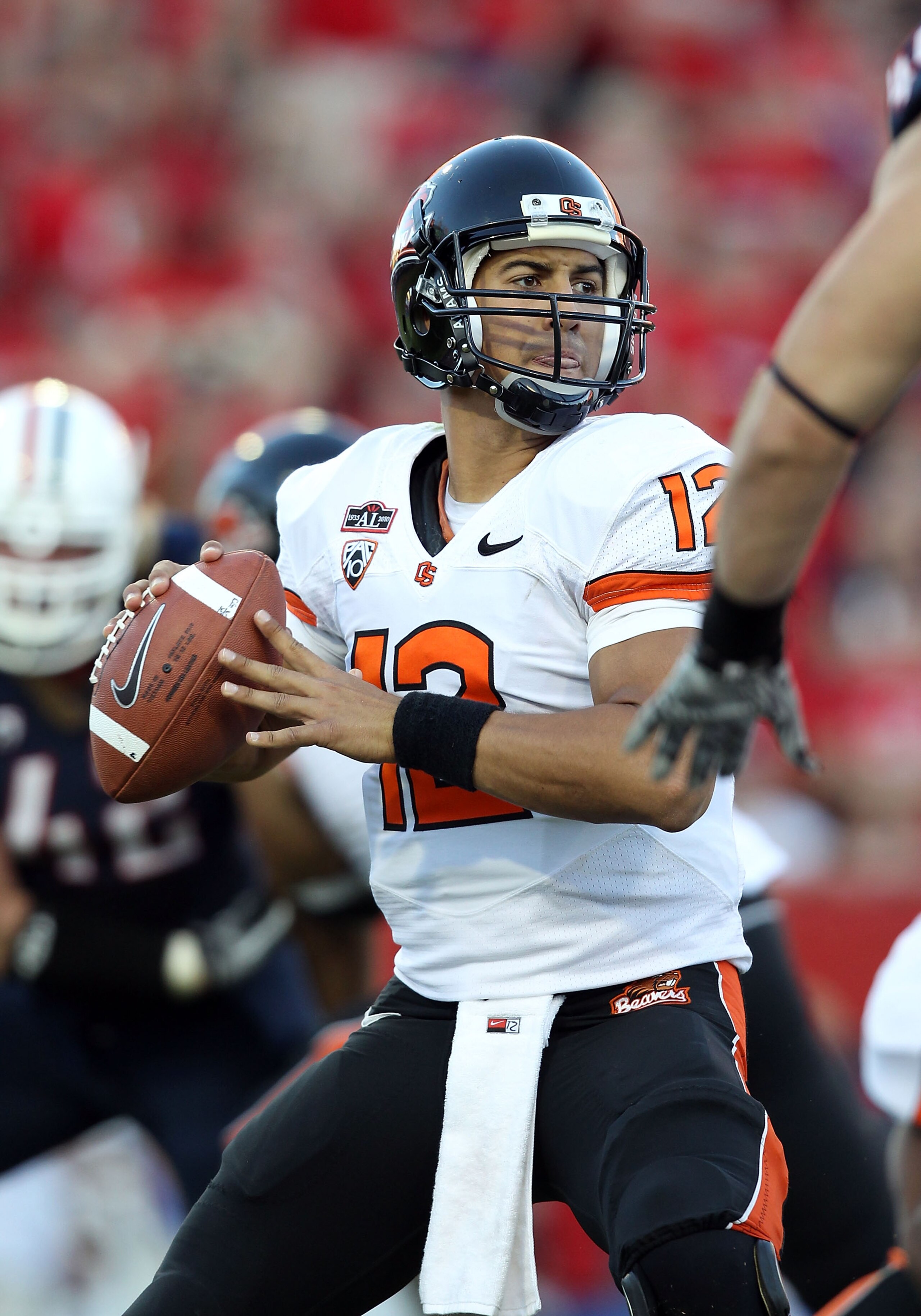 TUCSON, AZ - OCTOBER 09:  Quarterback Ryan Katz #12 of the Oregon State Beavers drops back to pass during the college football game against the Arizona Wildcats at Arizona Stadium on October 9, 2010 in Tucson, Arizona.  The Beavers defeated the Wildcats 2