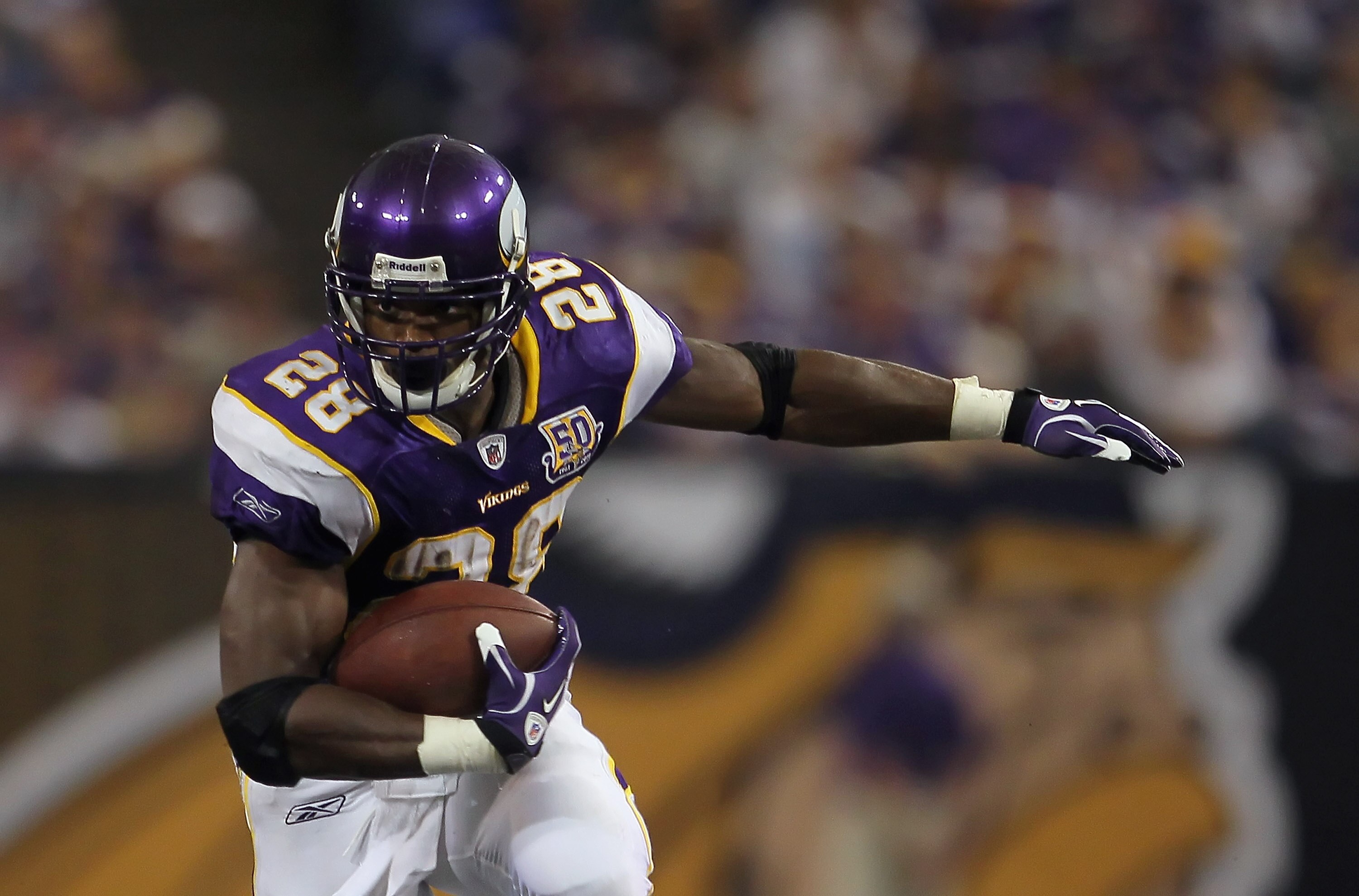 MINNEAPOLIS - SEPTEMBER 26:  Running back Adrian Peterson #28 of the Minnesota Vikings carries the ball against the Detroit Lions at Mall of America Field on September 26, 2010 in Minneapolis, Minnesota. The Vikings defeated the Lions 24-10.  (Photo by Je