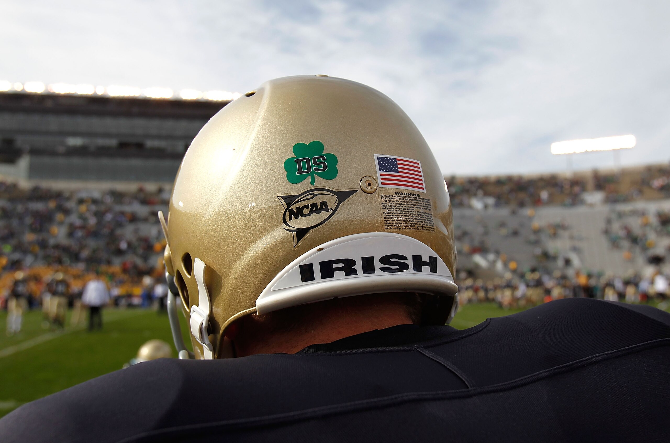 SOUTH BEND, IN - OCTOBER 30: A player for the Notre Dame Fighting Irish wears a decal on his helmut honoring Declan Sullivan, a student who was killed while videotaping a Notre Dame practice in high winds this past week, before a game against the Tulsa Go SOUTH BEND, IN - OCTOBER 30: A player for the Notre Dame Fighting Irish wears a decal on his helmut honoring Declan Sullivan, a student who was killed while videotaping a Notre Dame practice in high winds this past week, before a game against the Tulsa Go
