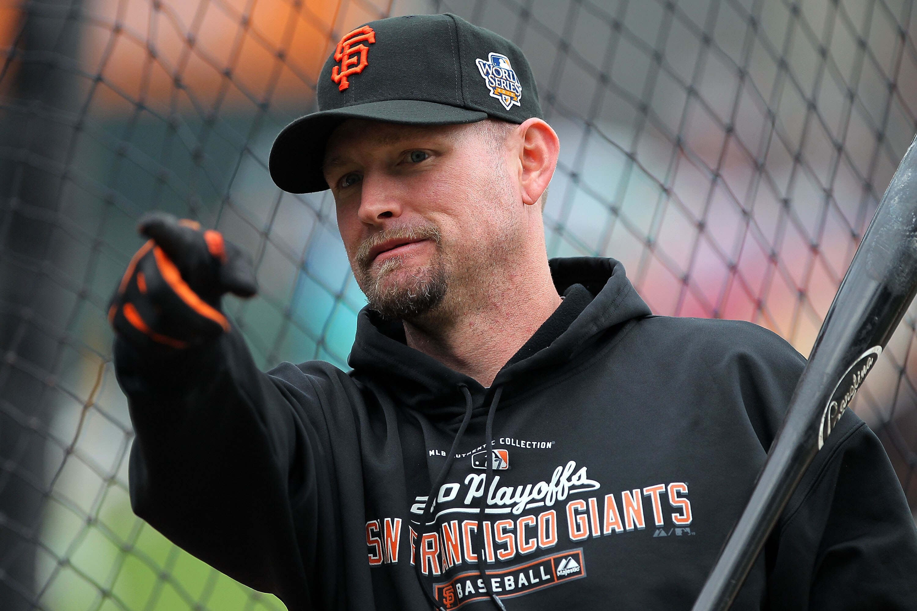 SAN FRANCISCO - OCTOBER 28:  Aubrey Huff #17 of the San Francisco Giants points during batting practice before Game Two of the 2010 MLB World Series against the Texas Rangers at AT&T Park on October 28, 2010 in San Francisco, California.  (Photo by Doug P