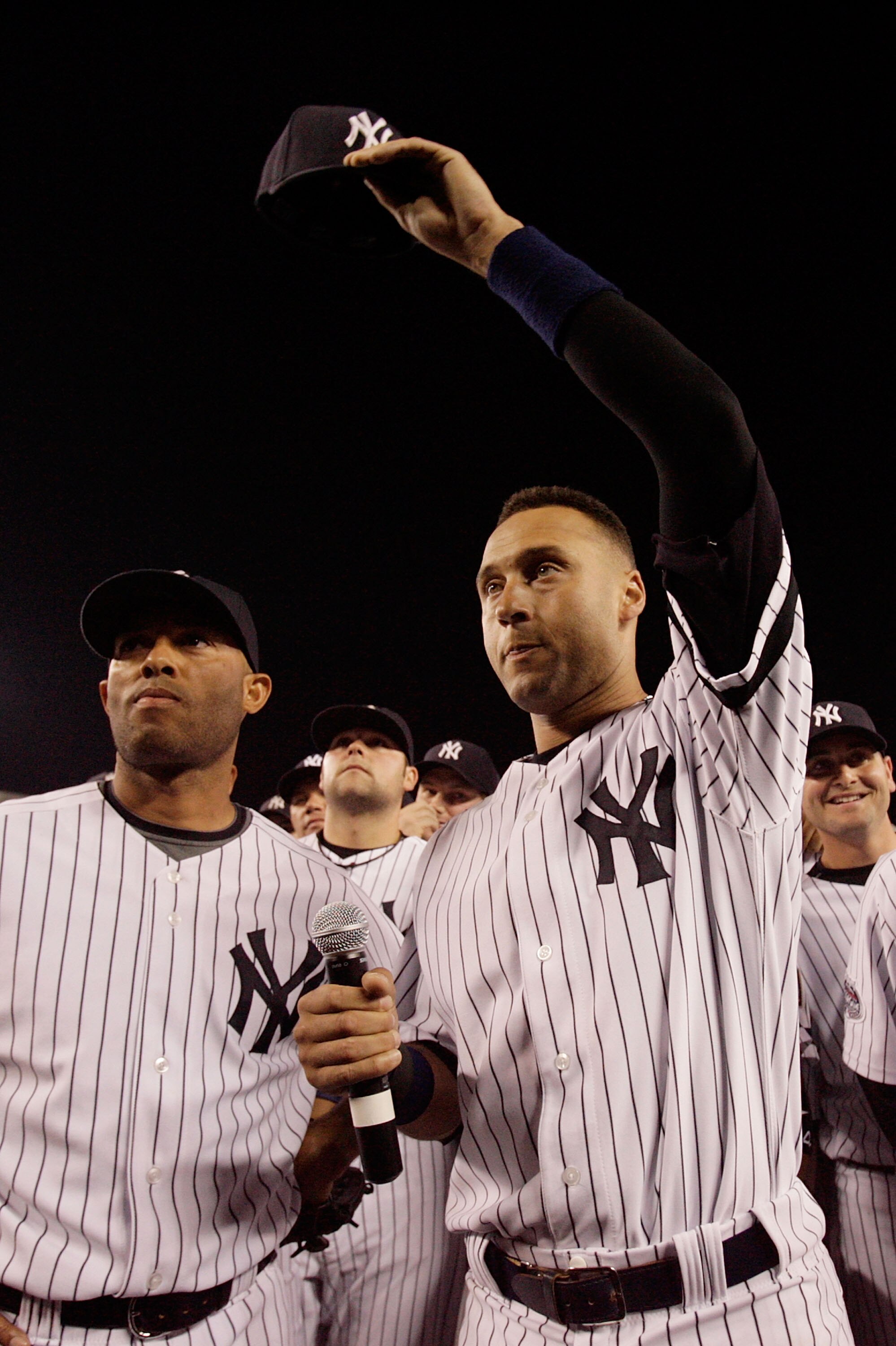 NEW YORK - SEPTEMBER 21:  Derek Jeter #2 and Mariano Rivera #42 of the New York Yankees wave to fans after the last regular season game at Yankee Stadium on September 21, 2008 in the Bronx borough of New York City. The Yankees are playing their final seas