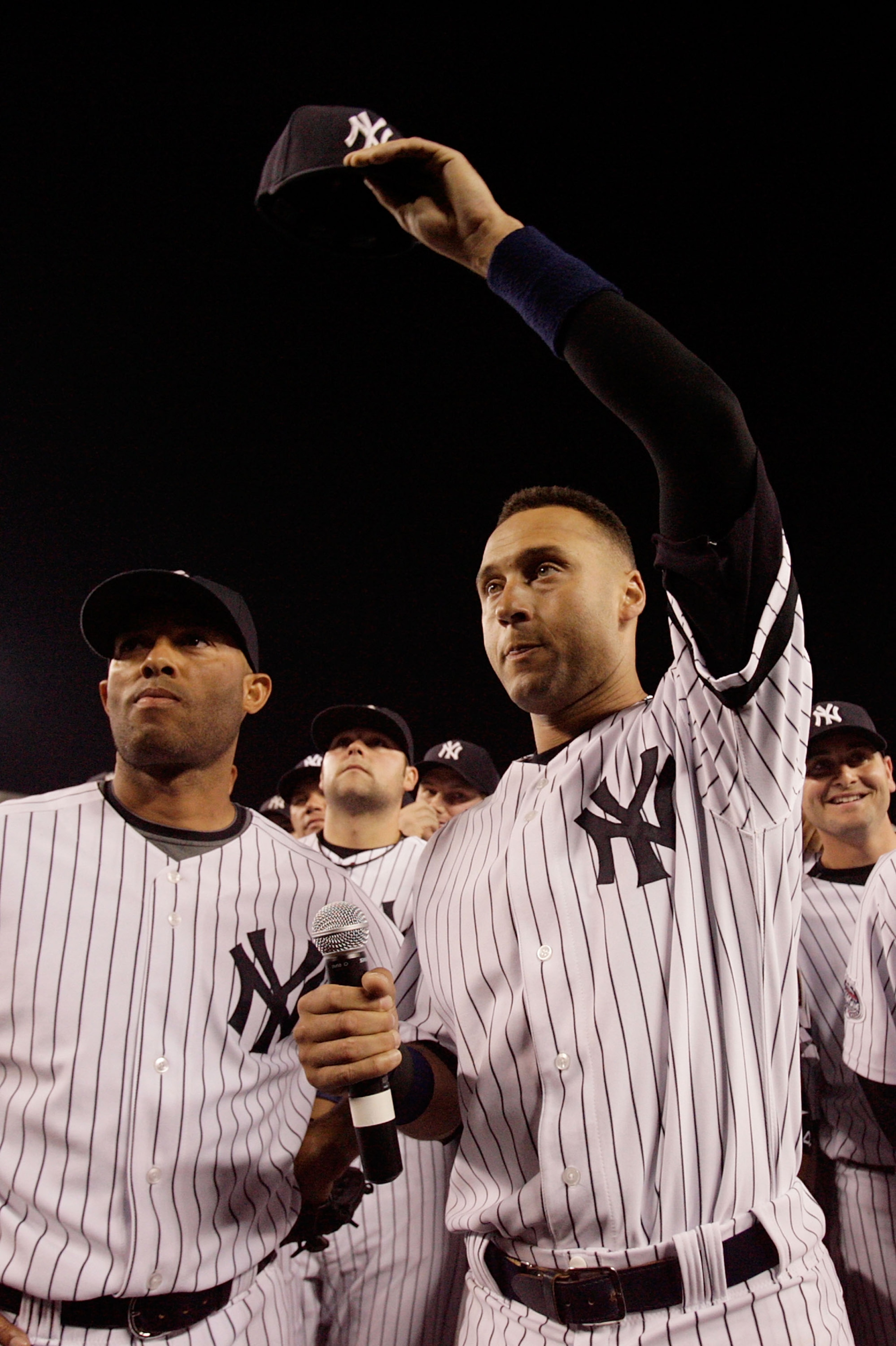 NEW YORK - SEPTEMBER 21:  Derek Jeter #2 and Mariano Rivera #42 of the New York Yankees wave to fans after the last regular season game at Yankee Stadium on September 21, 2008 in the Bronx borough of New York City. The Yankees are playing their final seas