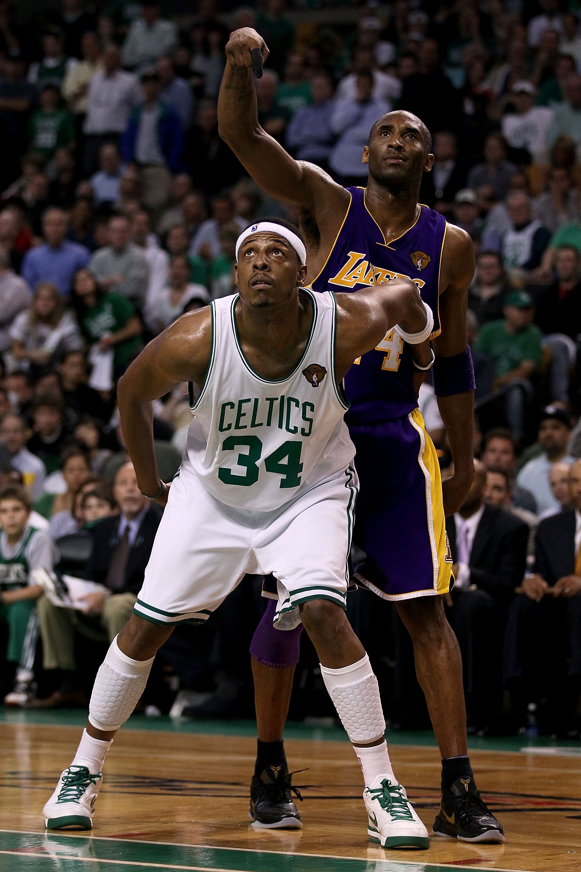 BOSTON - JUNE 10:  Paul Pierce #34 of the Boston Celltics and Kobe Bryant #24 of the Los Angeles Lakers wait under the basket during Game Four of the 2010 NBA Finals on June 10, 2010 at TD Garden in Boston, Massachusetts. NOTE TO USER: User expressly ackn