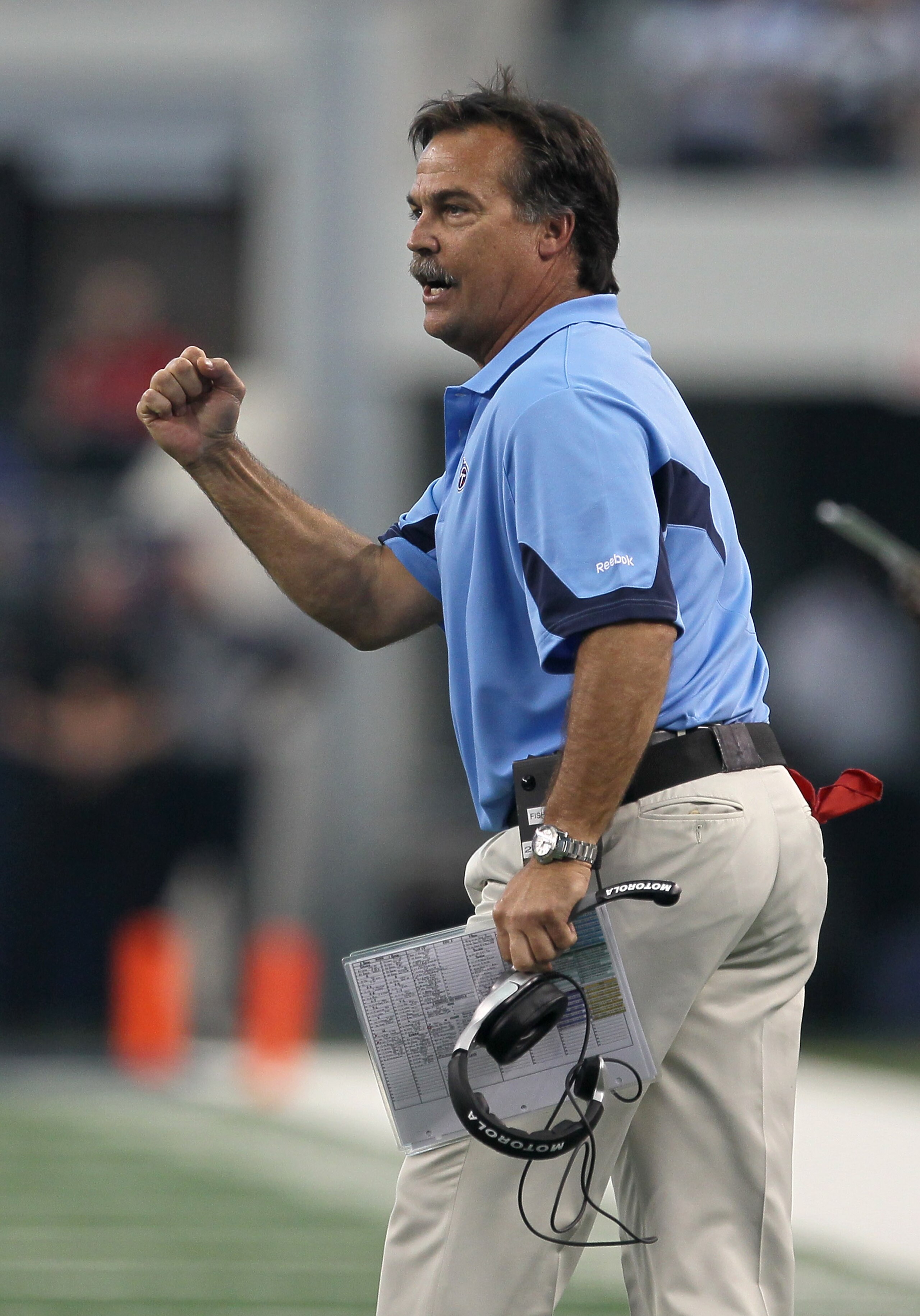 ARLINGTON, TX - OCTOBER 10: Head coach Jeff Fisher of the Tennessee Titans celebrates the Titans second touchdown of the game with the Dallas Cowboys at Cowboys Stadium on October 10, 2010 in Arlington, Texas. The Titans won 34-27. (Photo by Stephen Dun ARLINGTON, TX - OCTOBER 10: Head coach Jeff Fisher of the Tennessee Titans celebrates the Titans second touchdown of the game with the Dallas Cowboys at Cowboys Stadium on October 10, 2010 in Arlington, Texas. The Titans won 34-27. (Photo by Stephen Dun