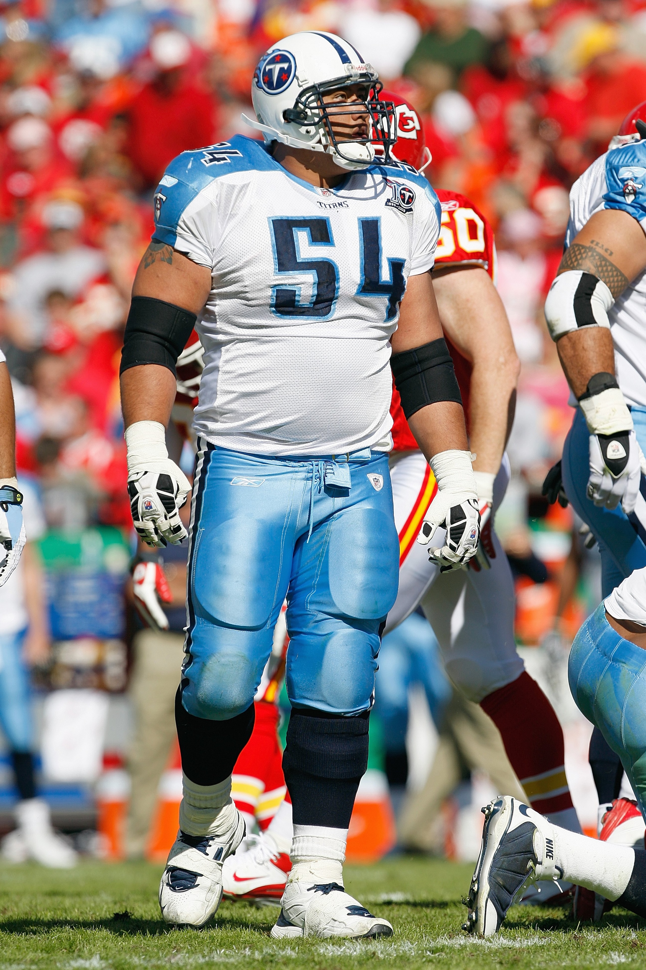 KANSAS CITY - OCTOBER 19: Eugene Amano #54 of the Tennessee Titans walks on the field during the game against the Kansas City Chiefs at Arrowhead Stadium on October 19, 2008 in Kansas City, Missouri. (Photo by: Jamie Squire/Getty Images) KANSAS CITY - OCTOBER 19: Eugene Amano #54 of the Tennessee Titans walks on the field during the game against the Kansas City Chiefs at Arrowhead Stadium on October 19, 2008 in Kansas City, Missouri. (Photo by: Jamie Squire/Getty Images)