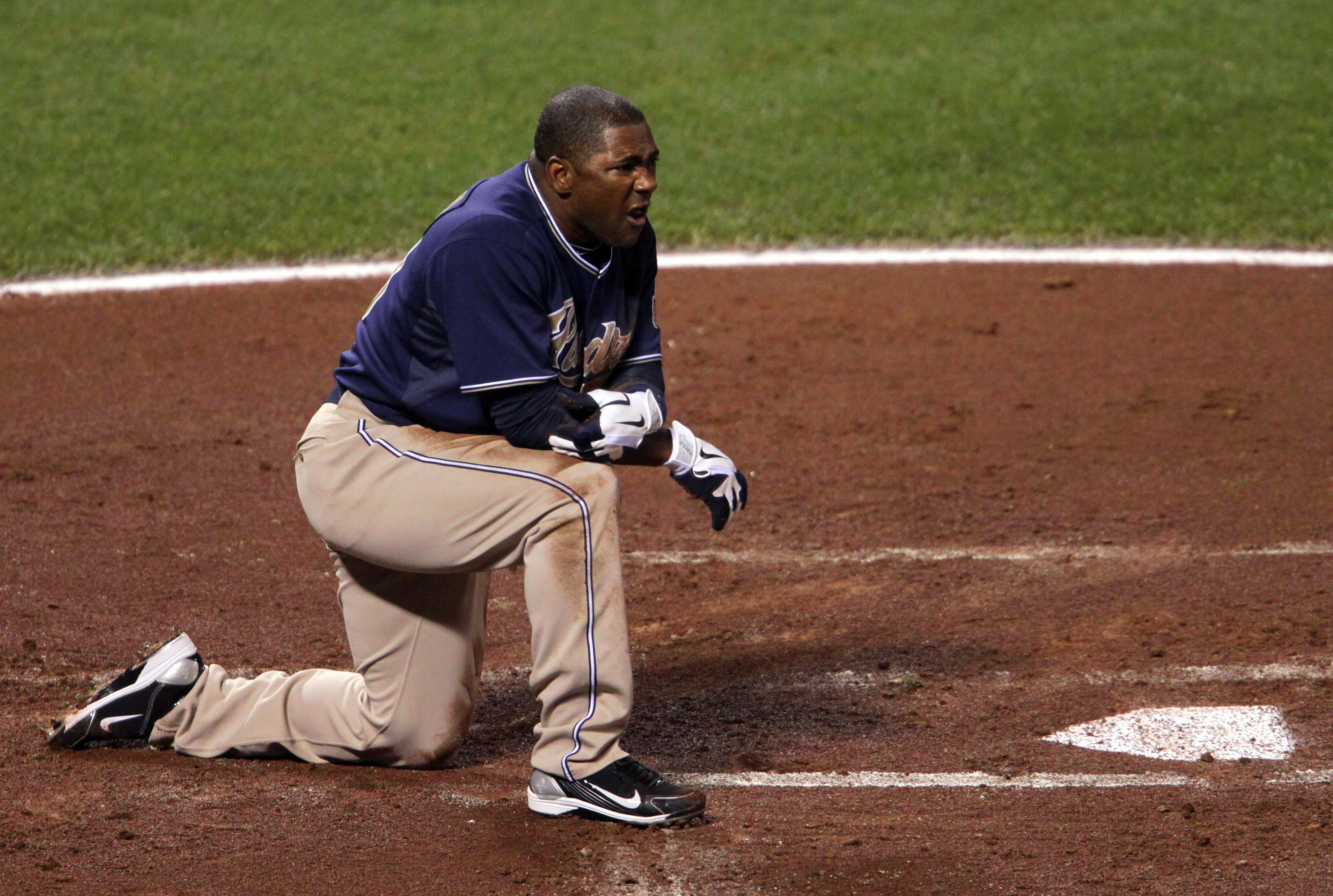 SAN FRANCISCO - OCTOBER 01:  Miguel Tejada #10 of the San Diego Padres reacts after being tagged out at home plate during the first inning against the San Francisco Giants at AT&T Park on October 1, 2010 in San Francisco, California.  (Photo by Justin Sul