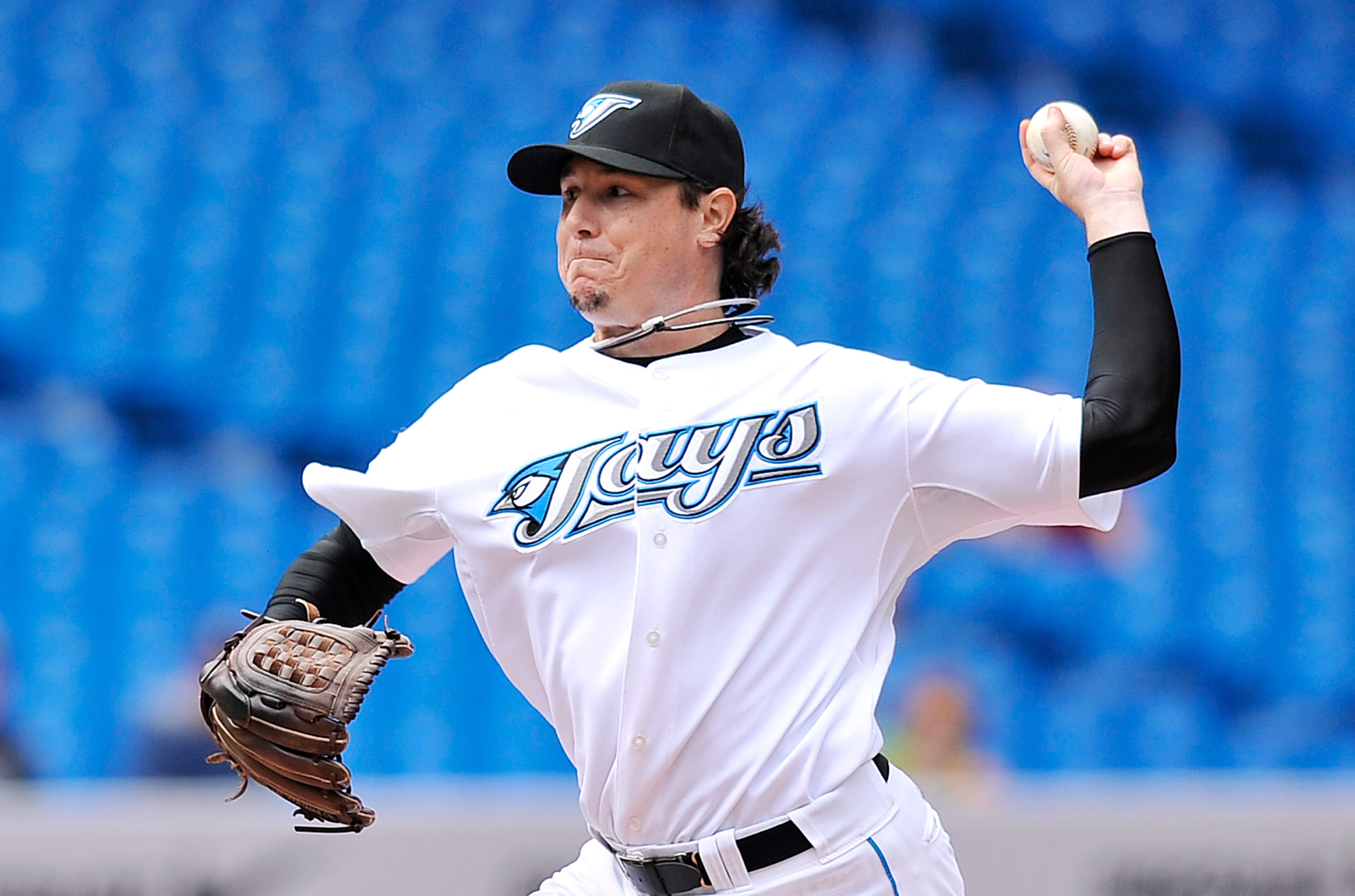 TORONTO - SEPTEMBER 23:   Scott Downs #37 of the Toronto Blue Jays pitches against the Seattle Mariners during the game on September 23, 2010 at Rogers Centre in Toronto, Ontario, Canada. The Blue Jays defeated the Mariners 1-0. (Photo by Brad White/Getty