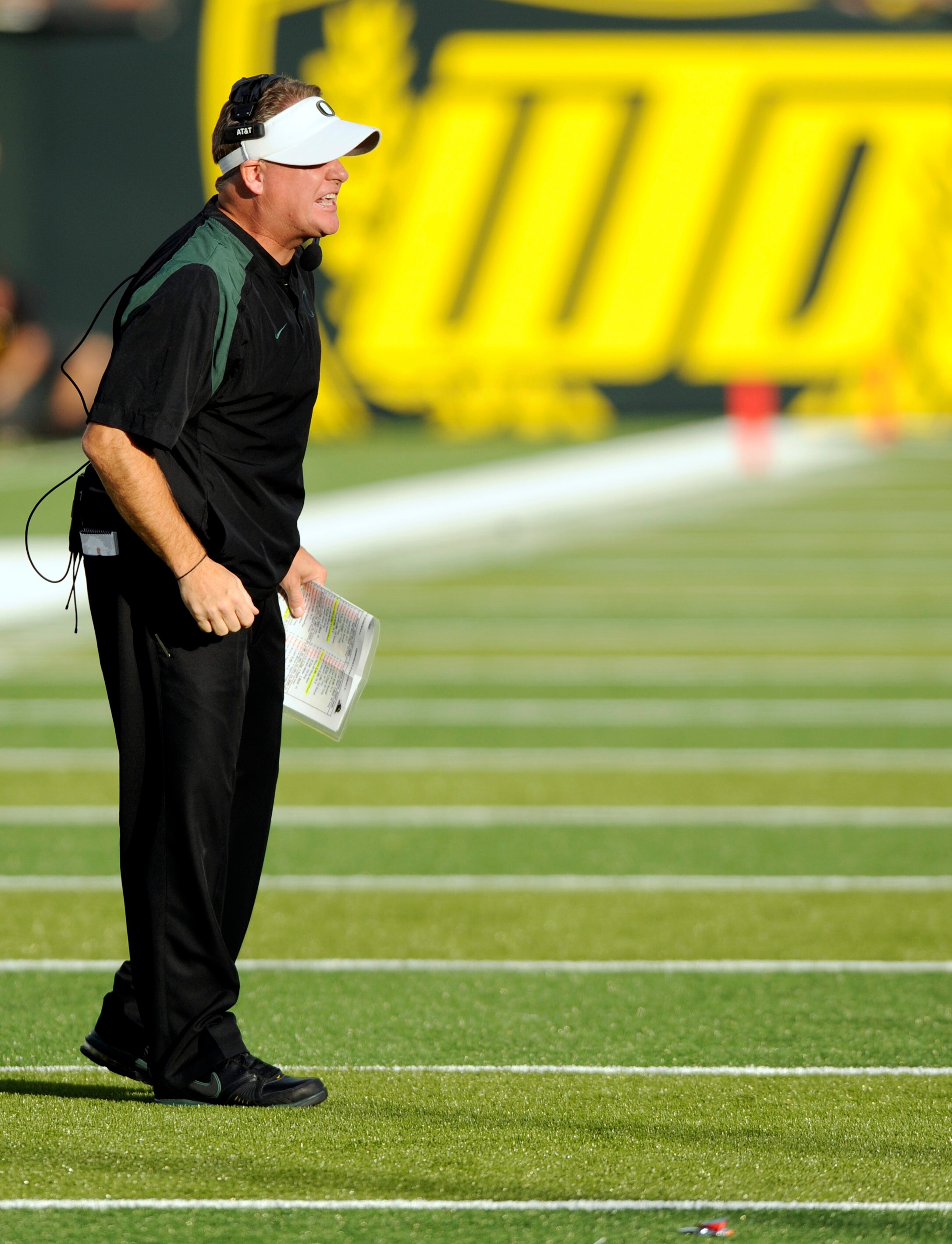 EUGENE, OR - OCTOBER 2: Head coach Chip Kelly of the Oregon Ducks yells out to his team in the first quarter of the game against the Stanford Cardinal at Autzen Stadium on October 2, 2010 in Eugene, Oregon. Oregon won the game 52-31. (Photo by Steve Dykes