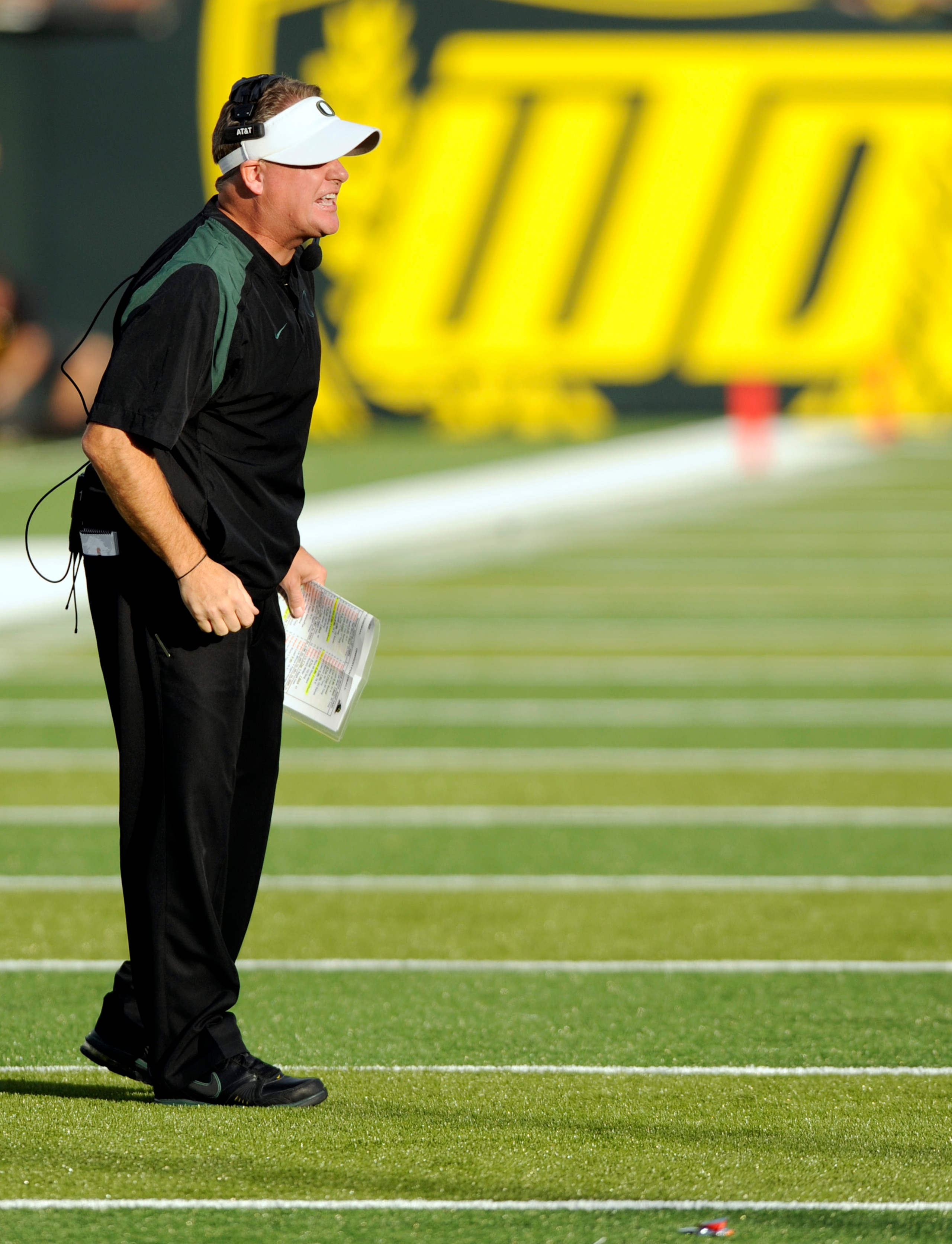 EUGENE, OR - OCTOBER 2: Head coach Chip Kelly of the Oregon Ducks yells out to his team in the first quarter of the game against the Stanford Cardinal at Autzen Stadium on October 2, 2010 in Eugene, Oregon. Oregon won the game 52-31. (Photo by Steve Dykes EUGENE, OR - OCTOBER 2: Head coach Chip Kelly of the Oregon Ducks yells out to his team in the first quarter of the game against the Stanford Cardinal at Autzen Stadium on October 2, 2010 in Eugene, Oregon. Oregon won the game 52-31. (Photo by Steve Dykes