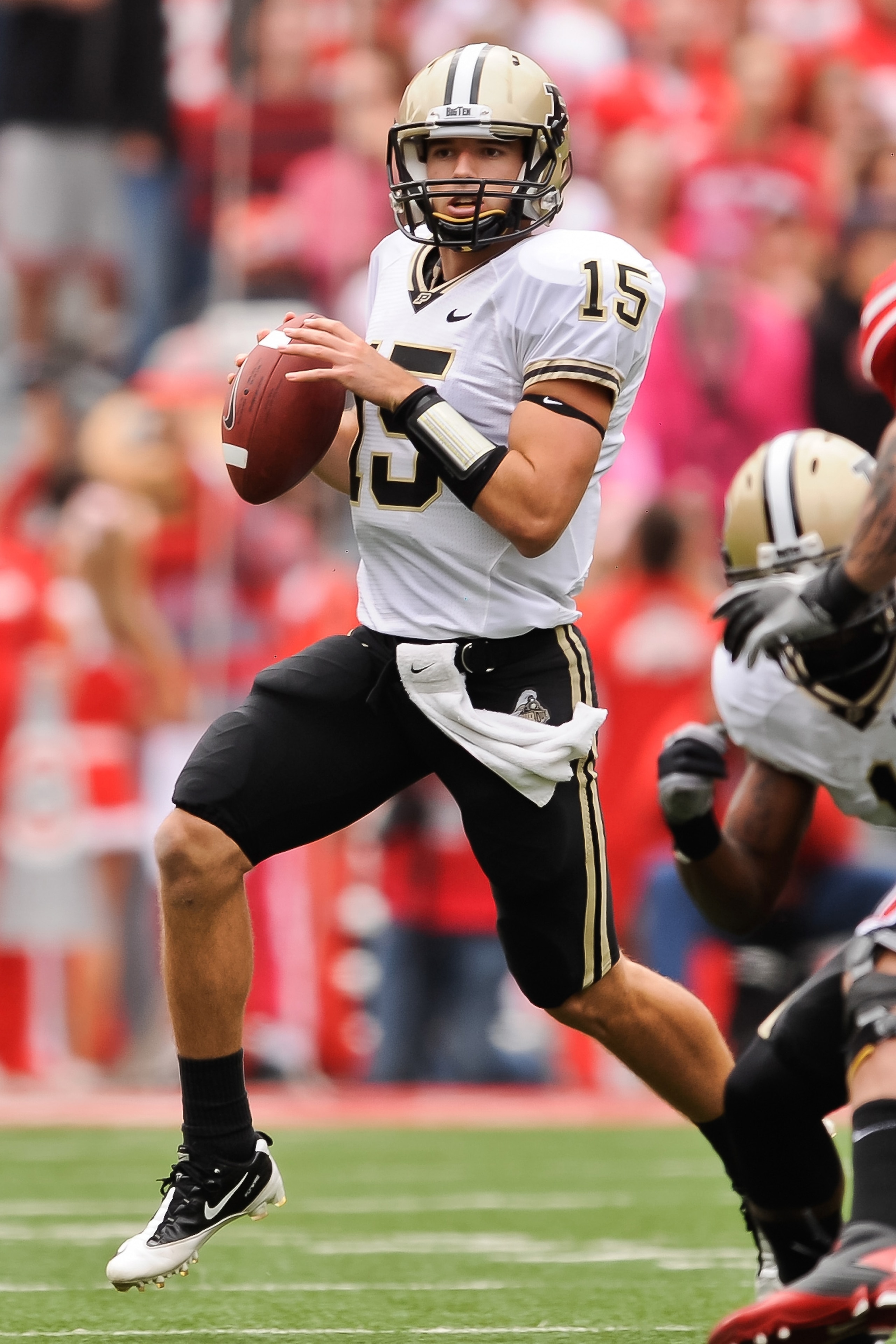 COLUMBUS, OH - OCTOBER 23: Quarterback Rob Henry #15 of the Purdue Boilermakers runs with the ball against the Ohio State Buckeyes at Ohio Stadium on October 23, 2010 in Columbus, Ohio. (Photo by Jamie Sabau/Getty Images) COLUMBUS, OH - OCTOBER 23: Quarterback Rob Henry #15 of the Purdue Boilermakers runs with the ball against the Ohio State Buckeyes at Ohio Stadium on October 23, 2010 in Columbus, Ohio. (Photo by Jamie Sabau/Getty Images)