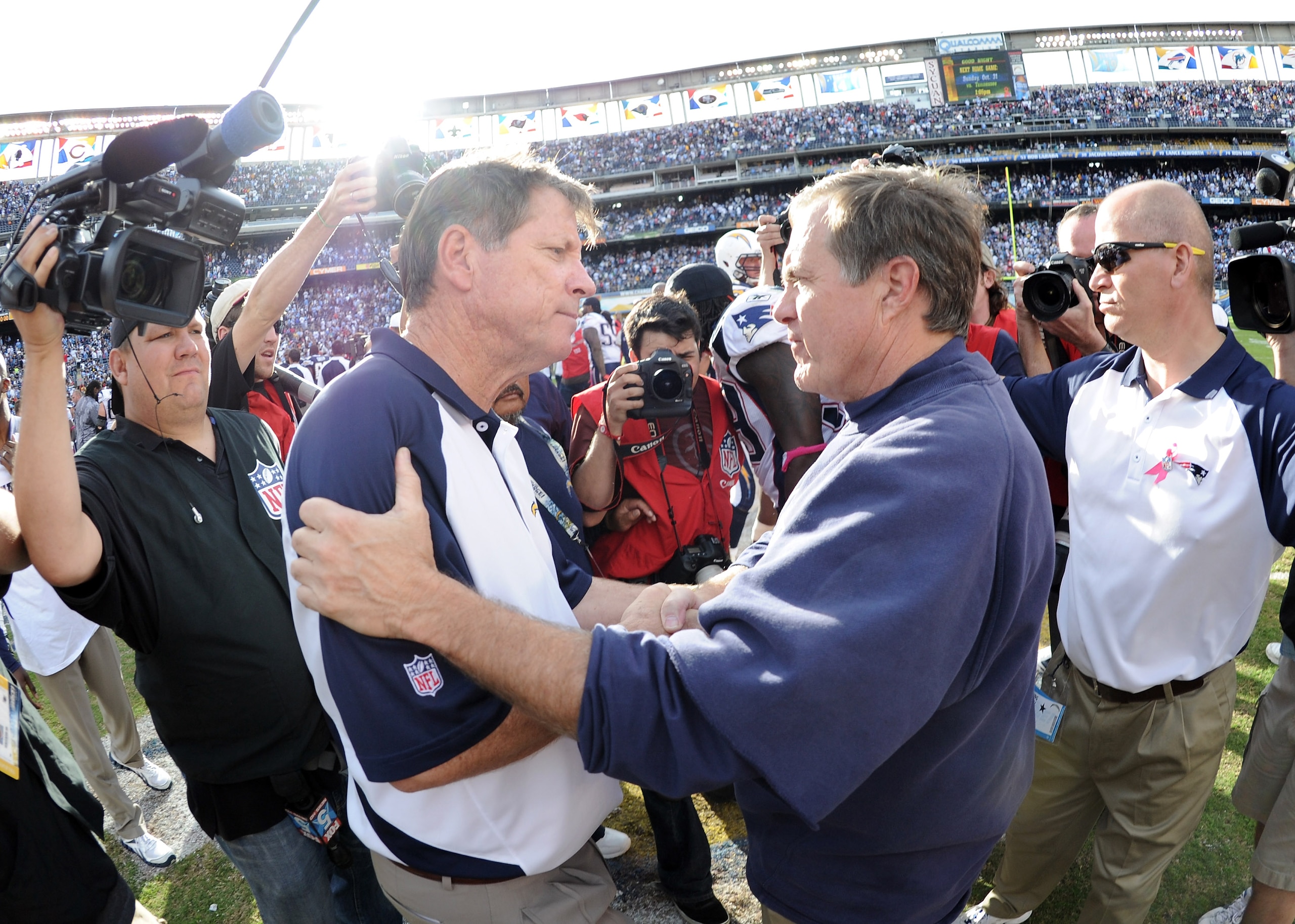 SAN DIEGO - OCTOBER 24:  Head Coaches Bill Belichick of the New England Patriots and Norv Turner of the San Diego Chargers greet each other at the end of the game after a 23-20 win by the Patriots at Qualcomm Stadium on October 24, 2010 in San Diego, Cali