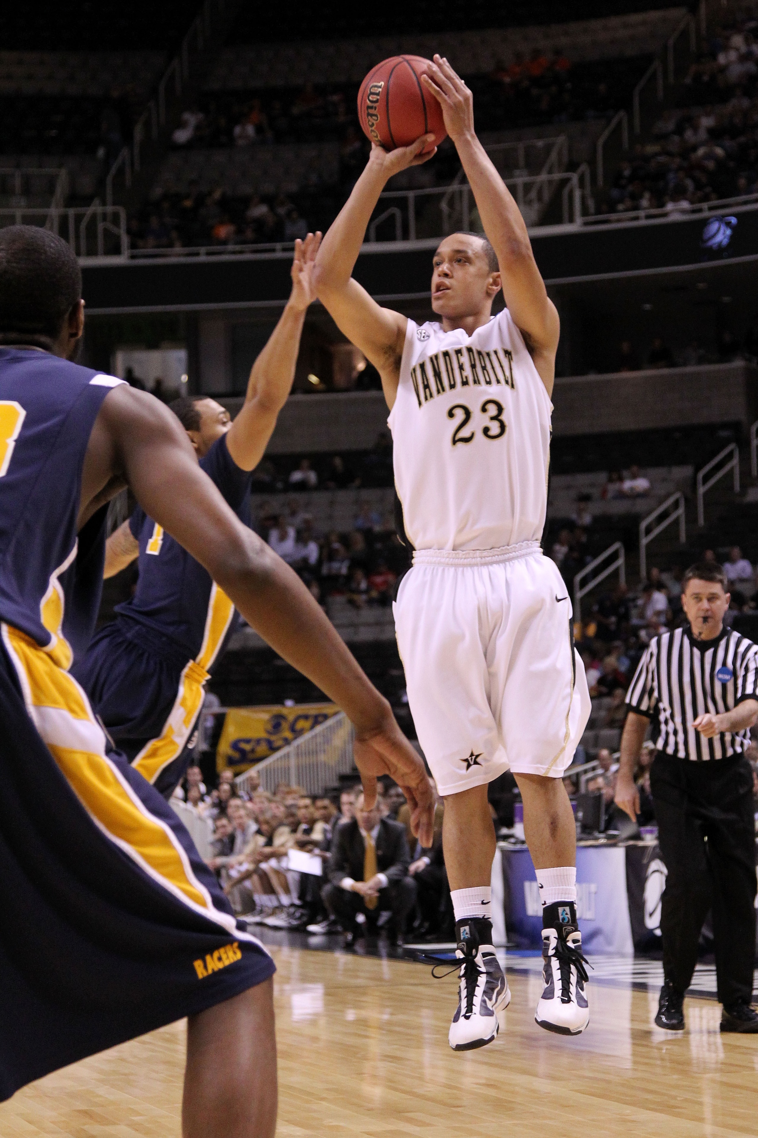SAN JOSE, CA - MARCH 18:  Guard John Jenkins #23 of the Vanderbilt Commodores takes a shot against the Murray State Racers during the first round of the 2010 NCAA menï¿½s basketball tournament at HP Pavilion on March 18, 2010 in San Jose, California.  (Phot