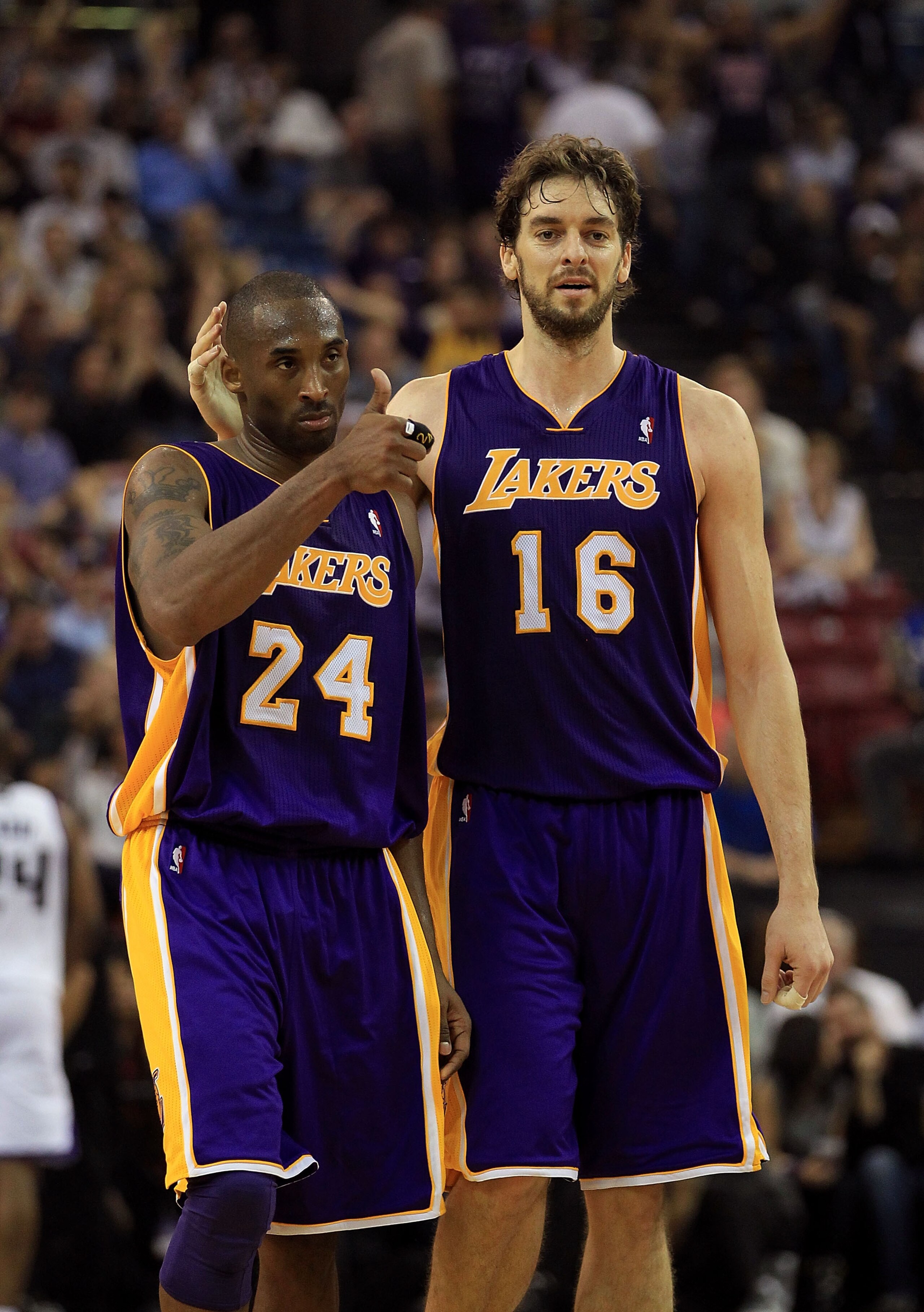 SACRAMENTO, CA - NOVEMBER 03:  Kobe Bryant #24 and Pau Gasol #16 of the Los Angeles Lakers walk off the court for halftime after the Lakers made a last second shot against the Sacramento Kings at ARCO Arena on November 3, 2010 in Sacramento, California.