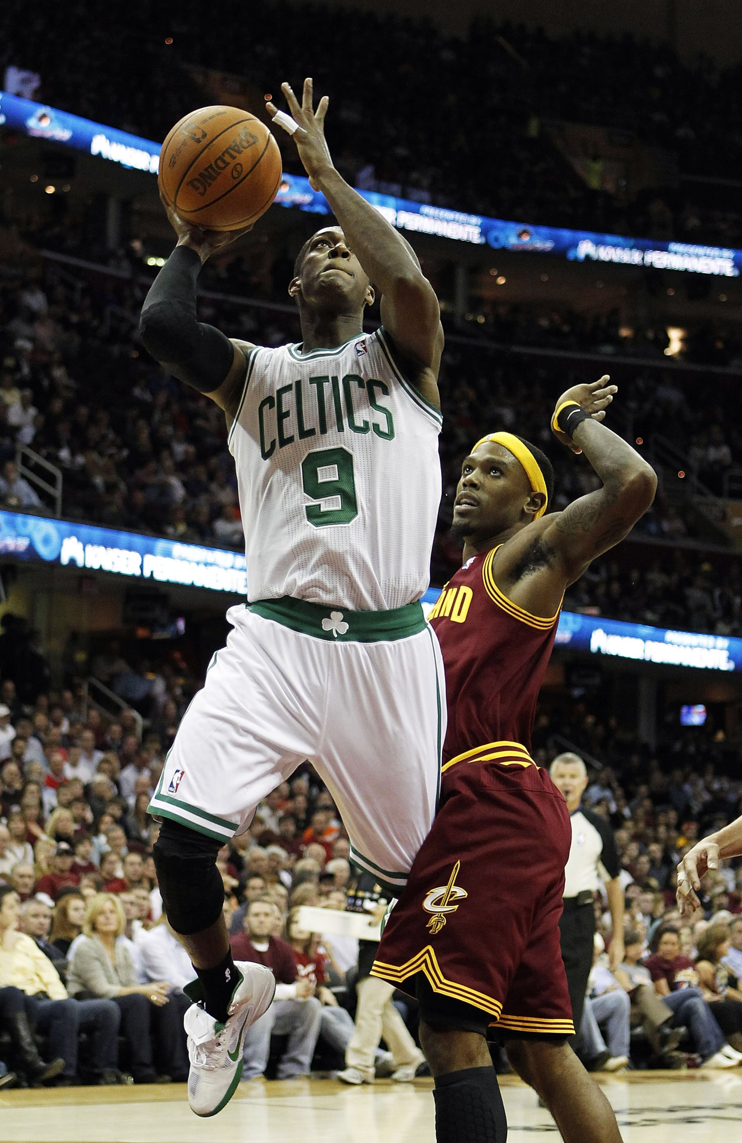 CLEVELAND - OCTOBER 27:  Rajon Rondo #9 of the Boston Celtics looks to get a shot off after getting around Daniel Gibson #1 of the Cleveland Cavaliers at Quicken Loans Arena on October 27, 2010 in Cleveland, Ohio.  (Photo by Gregory Shamus/Getty Images)