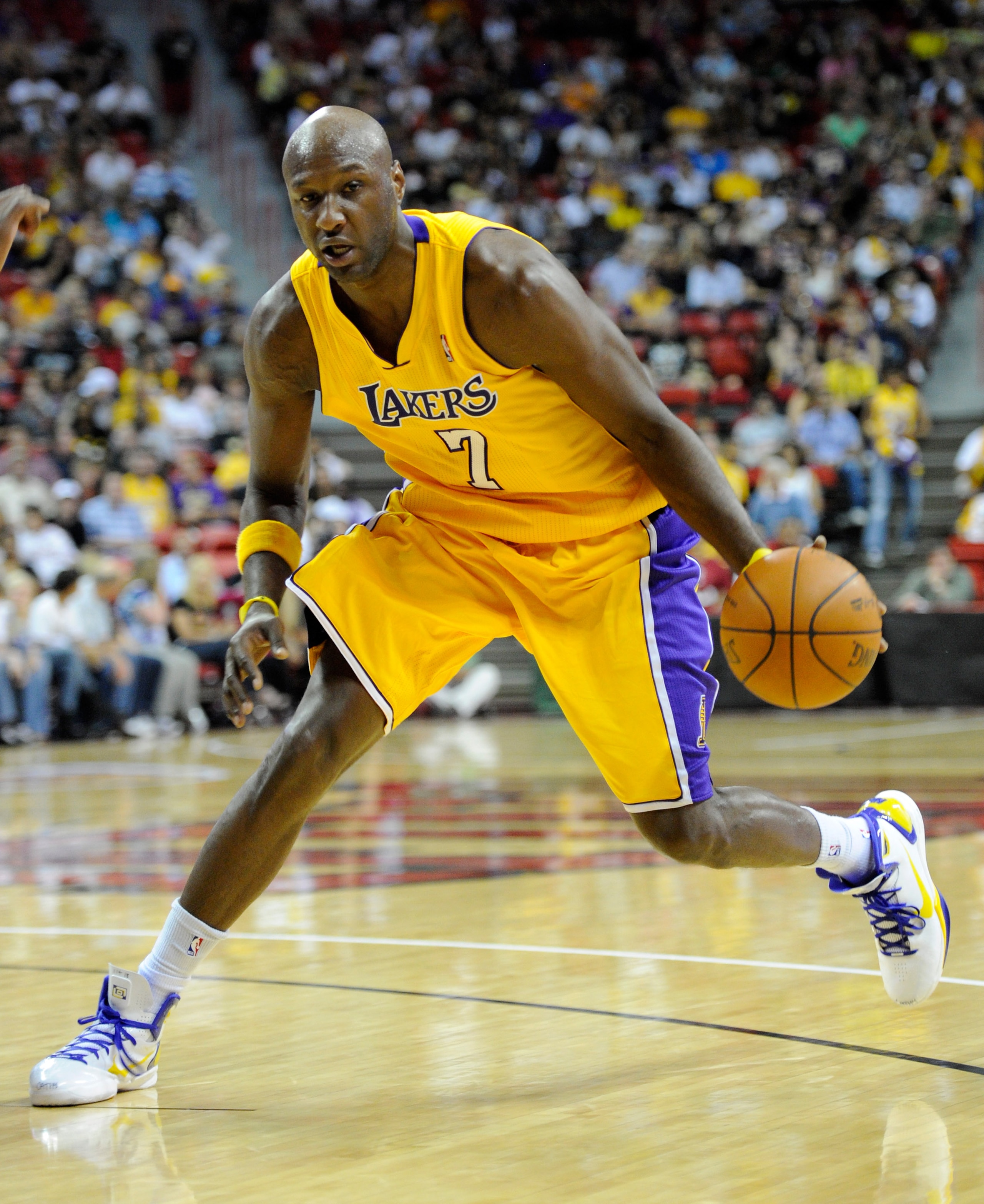LAS VEGAS - OCTOBER 13:  Lamar Odom #7 of the Los Angeles Lakers brings the ball up the court against the Sacramento Kings during their preseason game at the Thomas & Mack Center October 13, 2010 in Las Vegas, Nevada. The Lakers won 98-95. NOTE TO USER: U