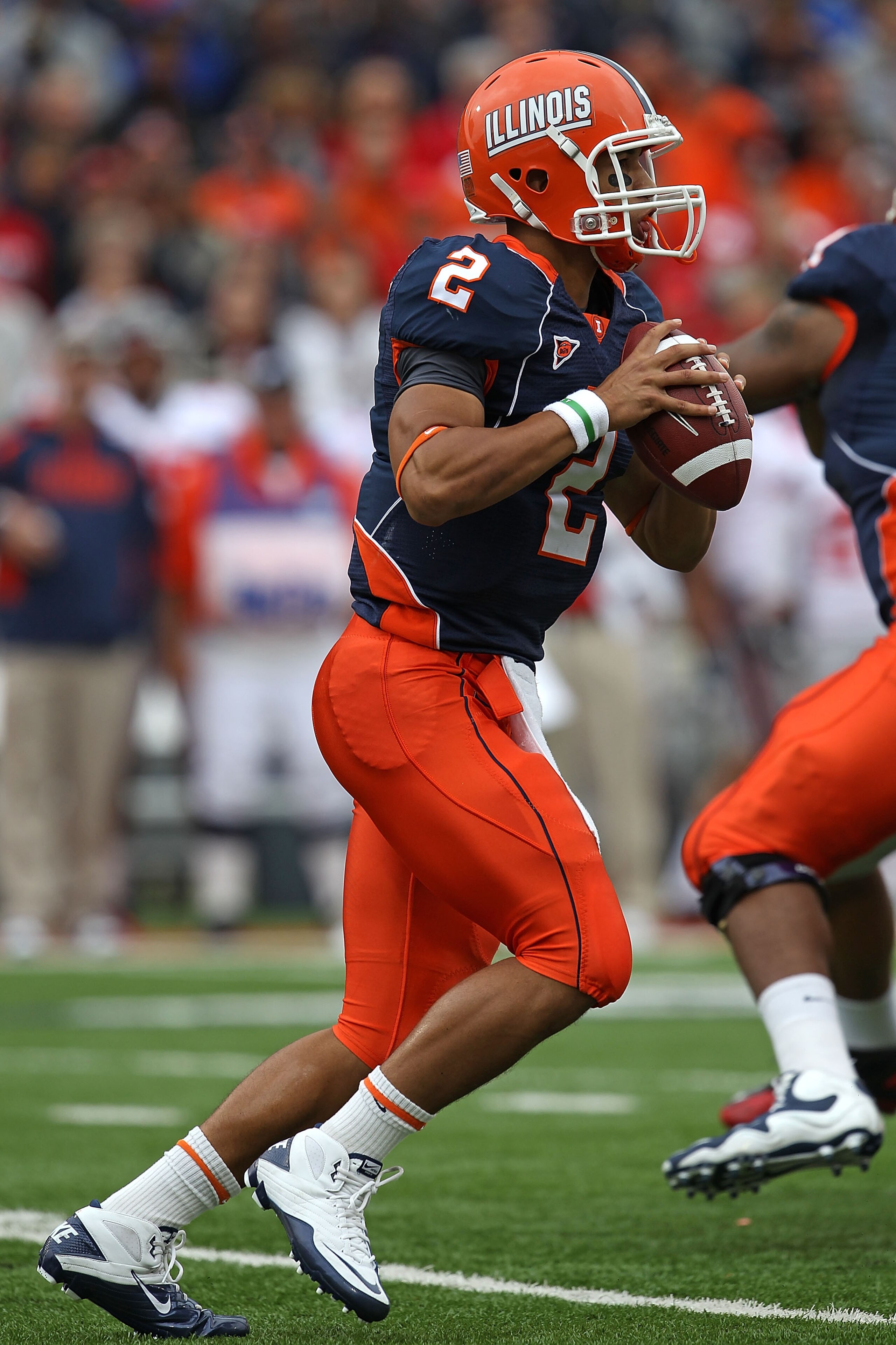 CHAMPAIGN, IL - OCTOBER 02: Nathan Scheelhaase #2 of the Illinois Fighting Illini looks for a receiver against the Ohio State Buckeyes at Memorial Stadium on October 2, 2010 in Champaign, Illinois. Ohio State defeated Illinois 24-13. (Photo by Jonathan Da CHAMPAIGN, IL - OCTOBER 02: Nathan Scheelhaase #2 of the Illinois Fighting Illini looks for a receiver against the Ohio State Buckeyes at Memorial Stadium on October 2, 2010 in Champaign, Illinois. Ohio State defeated Illinois 24-13. (Photo by Jonathan Da