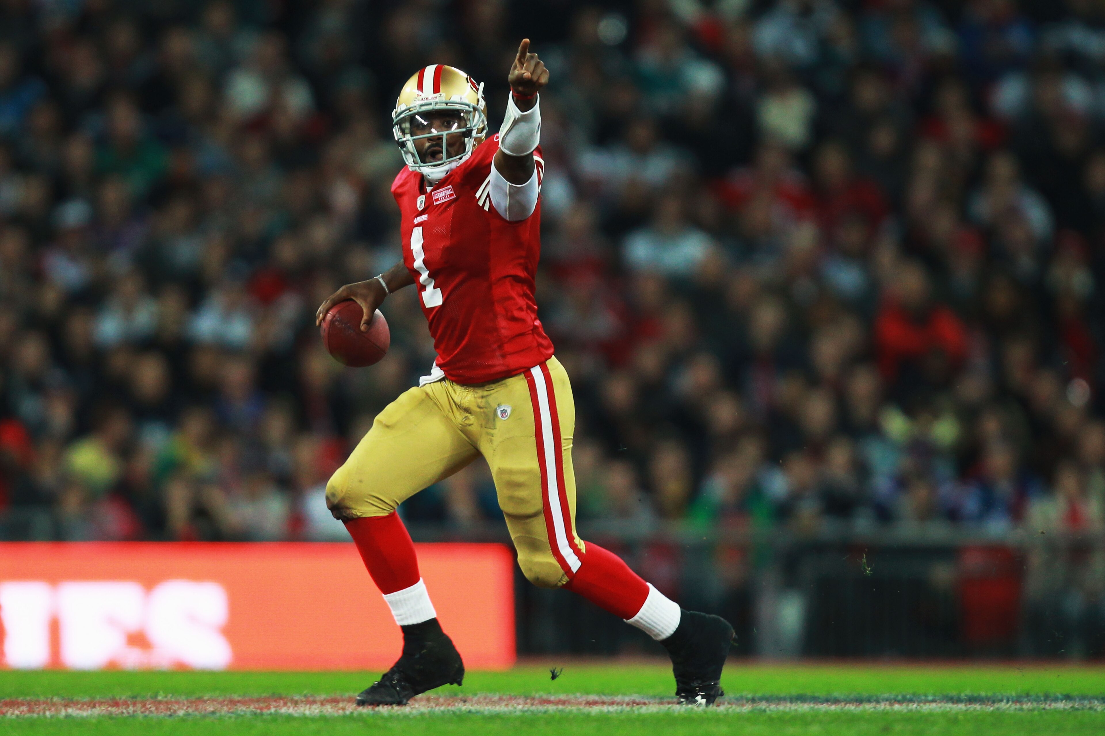 LONDON, ENGLAND - OCTOBER 31: Troy Smith #1 of San Francisco 49ers in action during the NFL International Series match between Denver Broncos and San Francisco 49ers at Wembley Stadium on October 31, 2010 in London, England. This is the fourth occasion w LONDON, ENGLAND - OCTOBER 31: Troy Smith #1 of San Francisco 49ers in action during the NFL International Series match between Denver Broncos and San Francisco 49ers at Wembley Stadium on October 31, 2010 in London, England. This is the fourth occasion w
