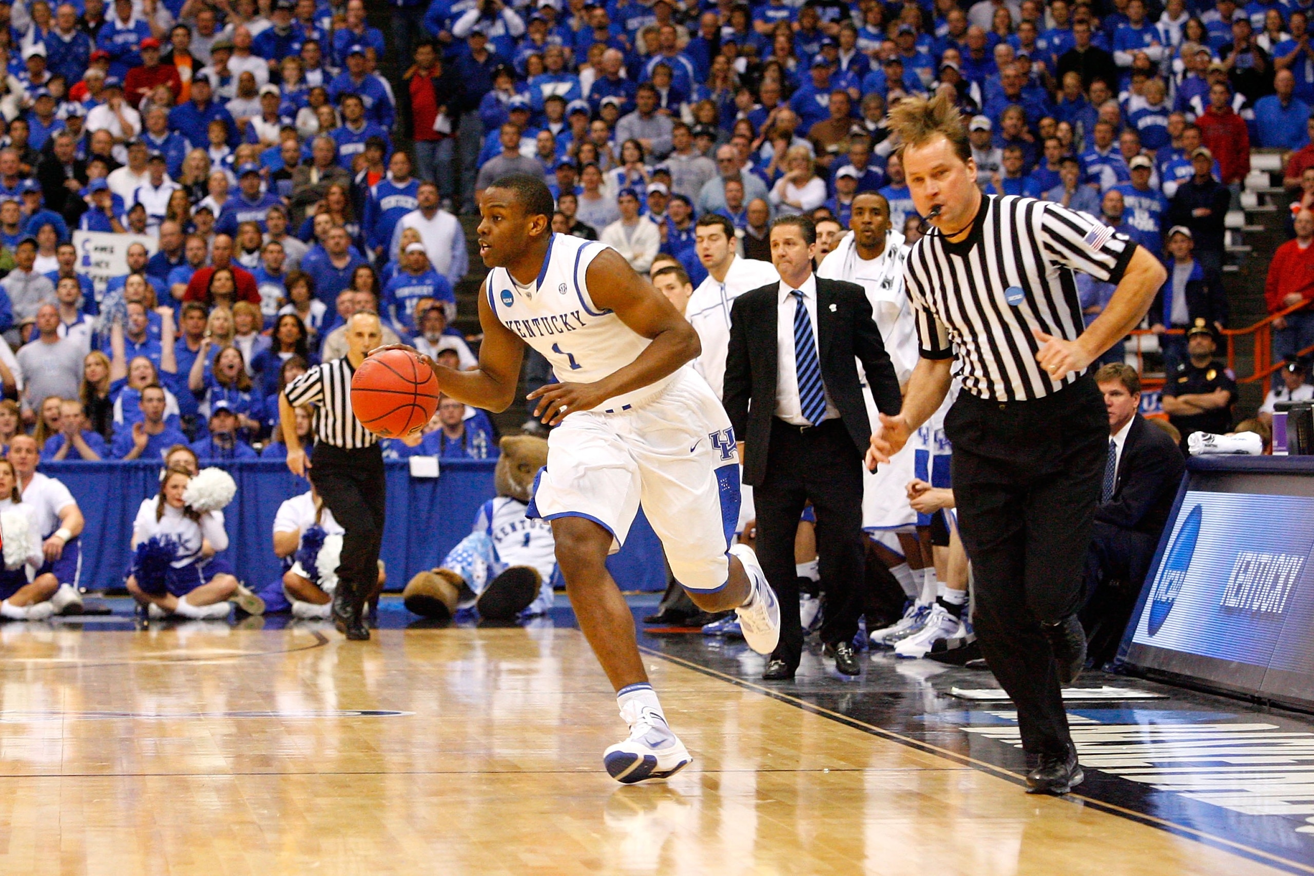 SYRACUSE, NY - MARCH 25:  Darius Miller #1 of the Kentucky Wildcats brings the ball up court against the Cornell Big Red during the east regional semifinal of the 2010 NCAA men's basketball tournament at the Carrier Dome on March 25, 2010 in Syracuse, New