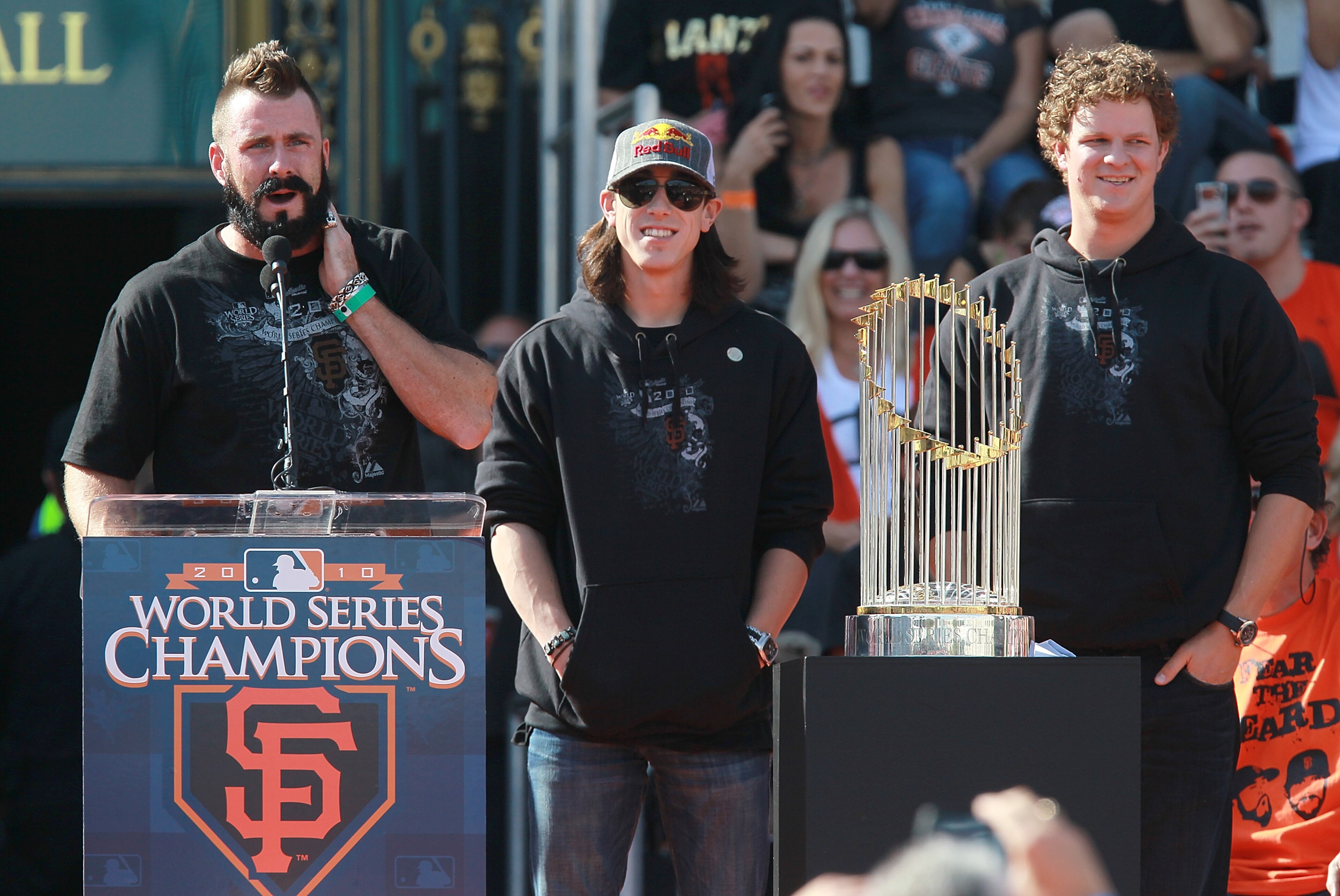 SAN FRANCISCO - NOVEMBER 03:  (L-R) San Francisco Giants pitchers Brian Wilson, Tim Lincecum and Matt Cain speak to fans outside San Francisco city hall during the Giants' victory parade and celebration on November 3, 2010 in San Francisco, California. Th