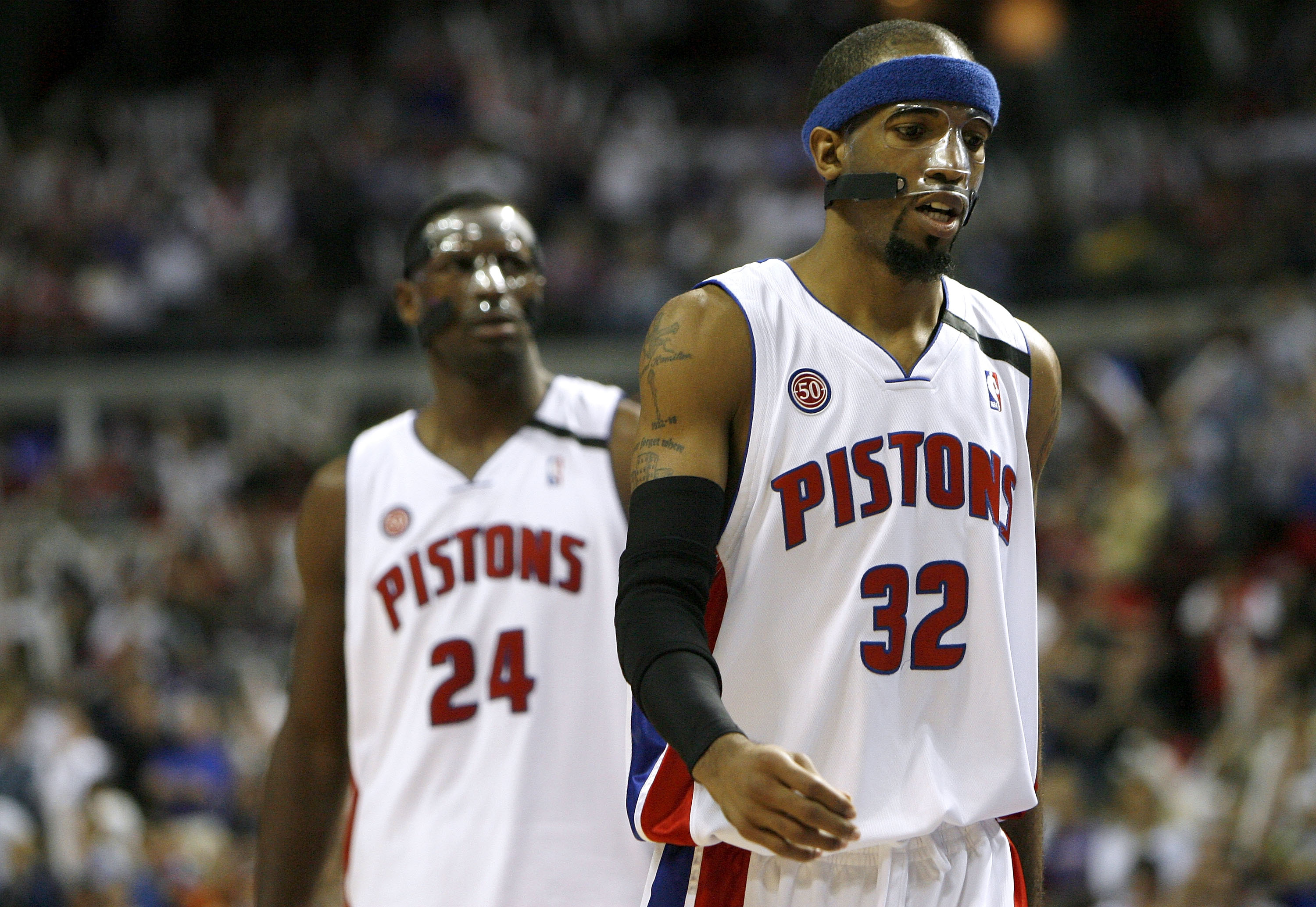 AUBURN HILLS, MI - MAY 05:  Richard Hamilton #32 and Antonio McDyess #24 of the Detroit Pistons who both wear protective masks walk up the court while playing the Orlando Magic during Game Two of the Eastern Conference Semifinals during the 2008 NBA Playo