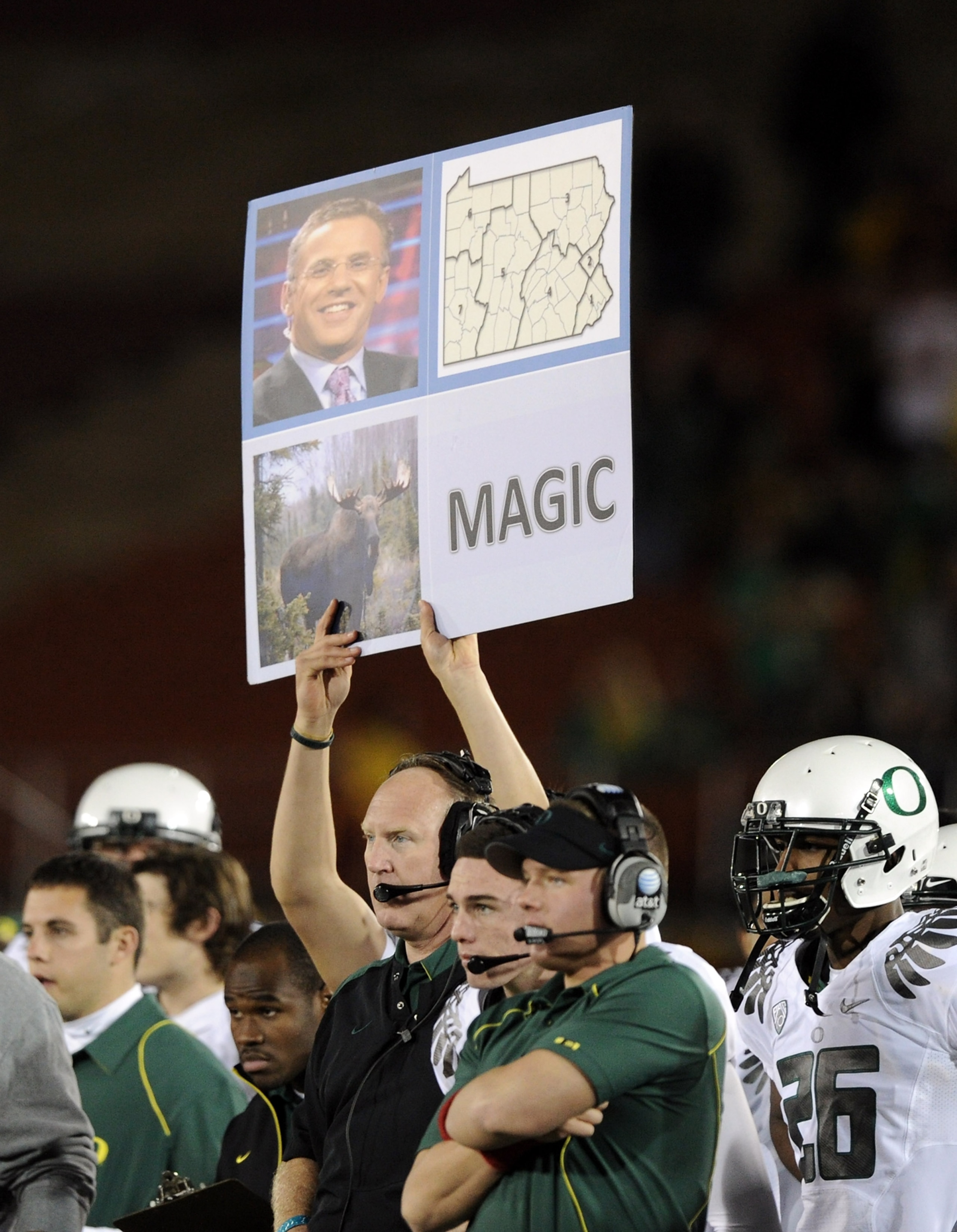 LOS ANGELES, CA - OCTOBER 30:  Oregon Ducks use a sign to signal a play against the USC Trojans during the fourth quarter at Los Angeles Memorial Coliseum on October 30, 2010 in Los Angeles, California.  (Photo by Harry How/Getty Images)