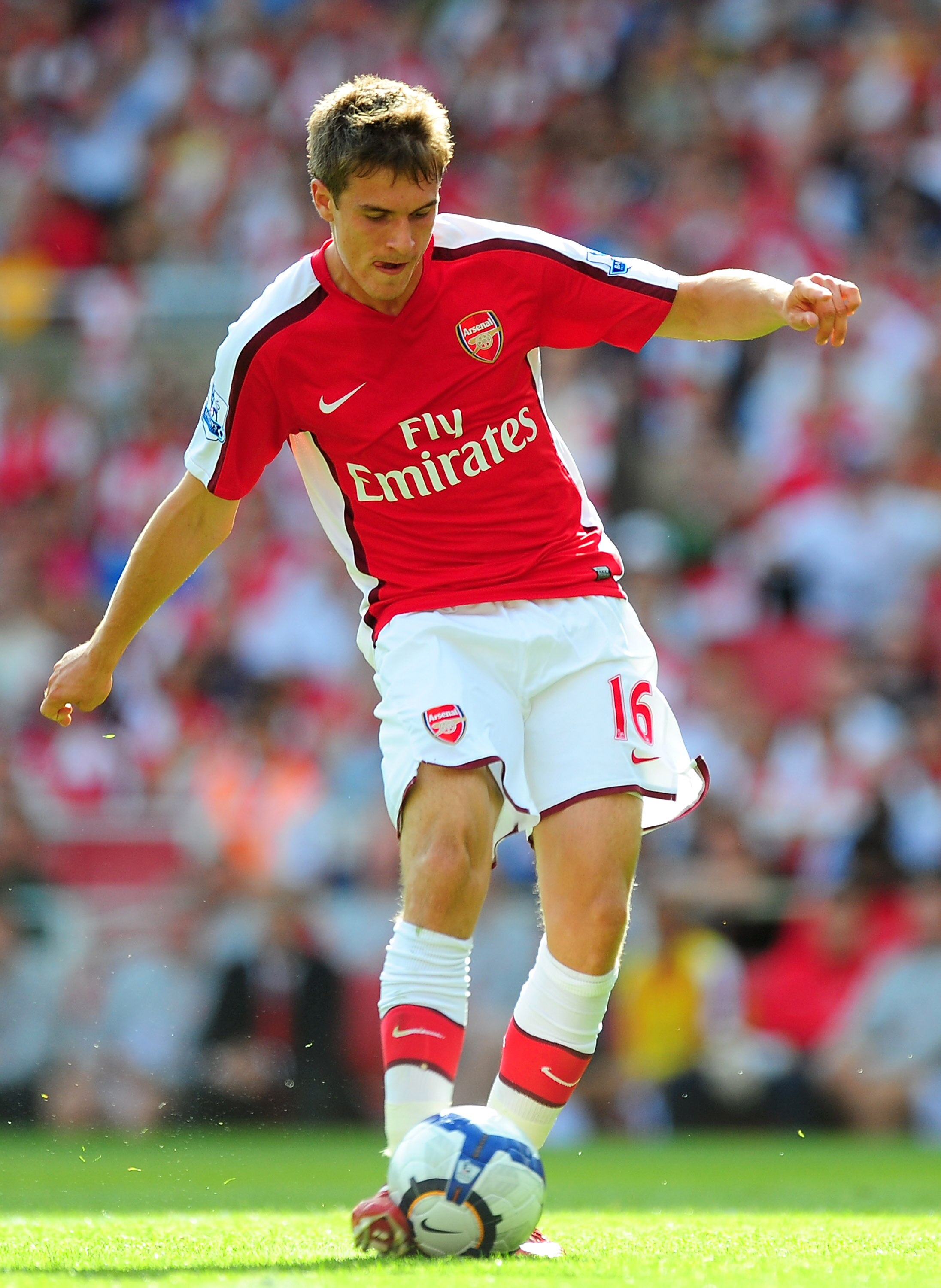 LONDON, ENGLAND - AUGUST 22:  Aaron Ramsey of Arsenal shoots towards goal and scores the fourth goal during the Barclays Premier League match between Arsenal and Portsmouth at the Emirates Stadium on August 22, 2009 in London, England.  (Photo by Mike Hew