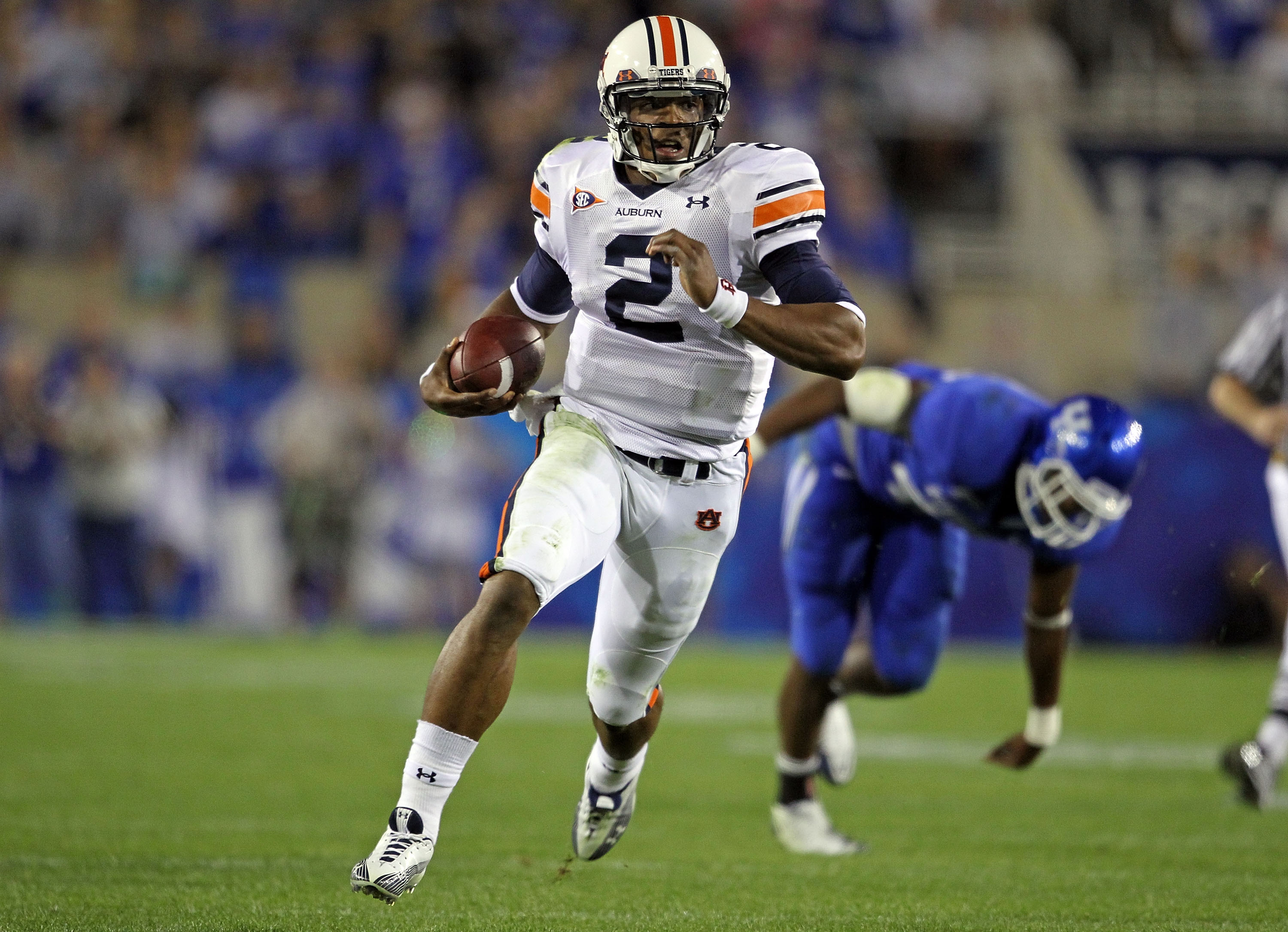 LEXINGTON, KY - OCTOBER 09:  Cam Newton #2 of the Auburn Tigers runs with the ball during the SEC game against the Kentucky Wildcats at Commonwealth Stadium on October 9, 2010 in Lexington, Kentucky.  (Photo by Andy Lyons/Getty Images)