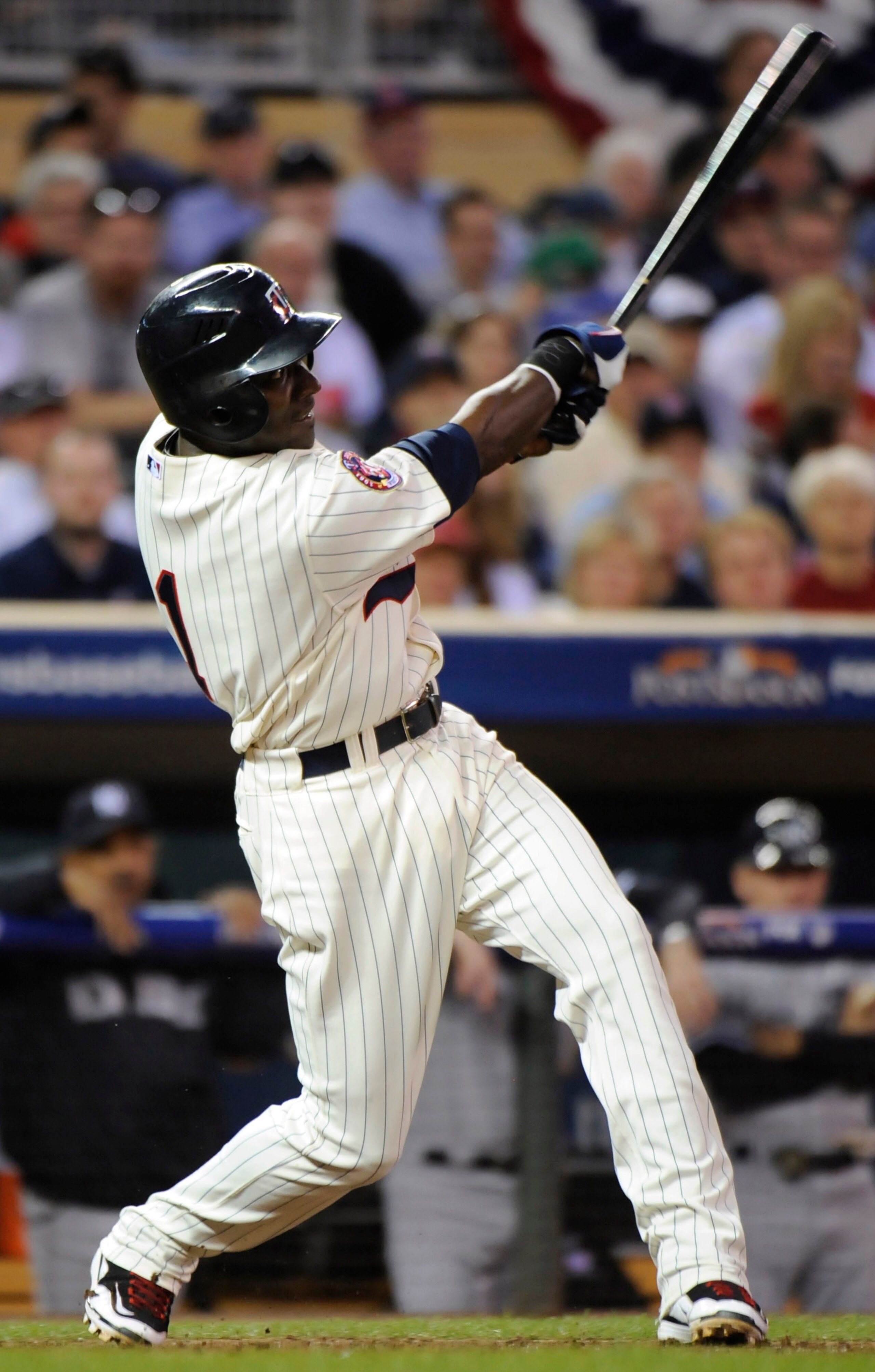MINNEAPOLIS, MN - OCTOBER 7: Orlando Hudson #1 of the Minnesota Twins hits a solo home run in the sixth inning during game two of the ALDS game against the New York Yankees on October 7, 2010 at Target Field in Minneapolis, Minnesota.  (Photo by Hannah Fo