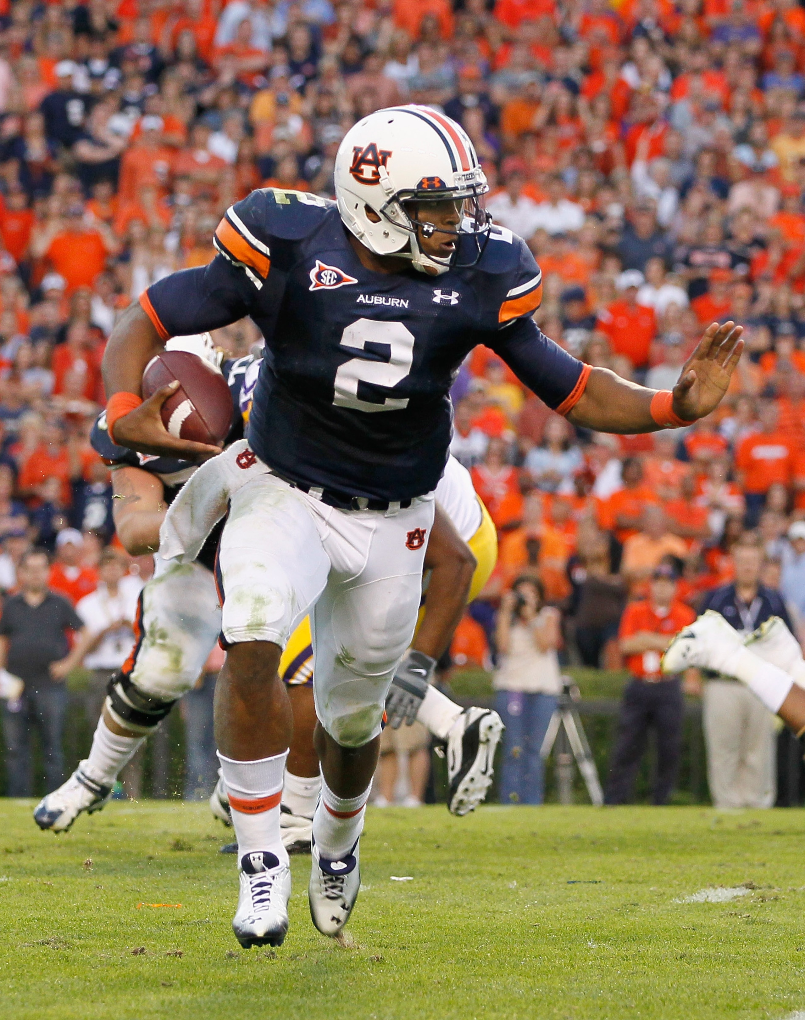 AUBURN, AL - OCTOBER 23: Quarterback Cameron Newton #2 of the Auburn Tigers rushes upfield against the LSU Tigers at Jordan-Hare Stadium on October 23, 2010 in Auburn, Alabama. (Photo by Kevin C. Cox/Getty Images) AUBURN, AL - OCTOBER 23: Quarterback Cameron Newton #2 of the Auburn Tigers rushes upfield against the LSU Tigers at Jordan-Hare Stadium on October 23, 2010 in Auburn, Alabama. (Photo by Kevin C. Cox/Getty Images)
