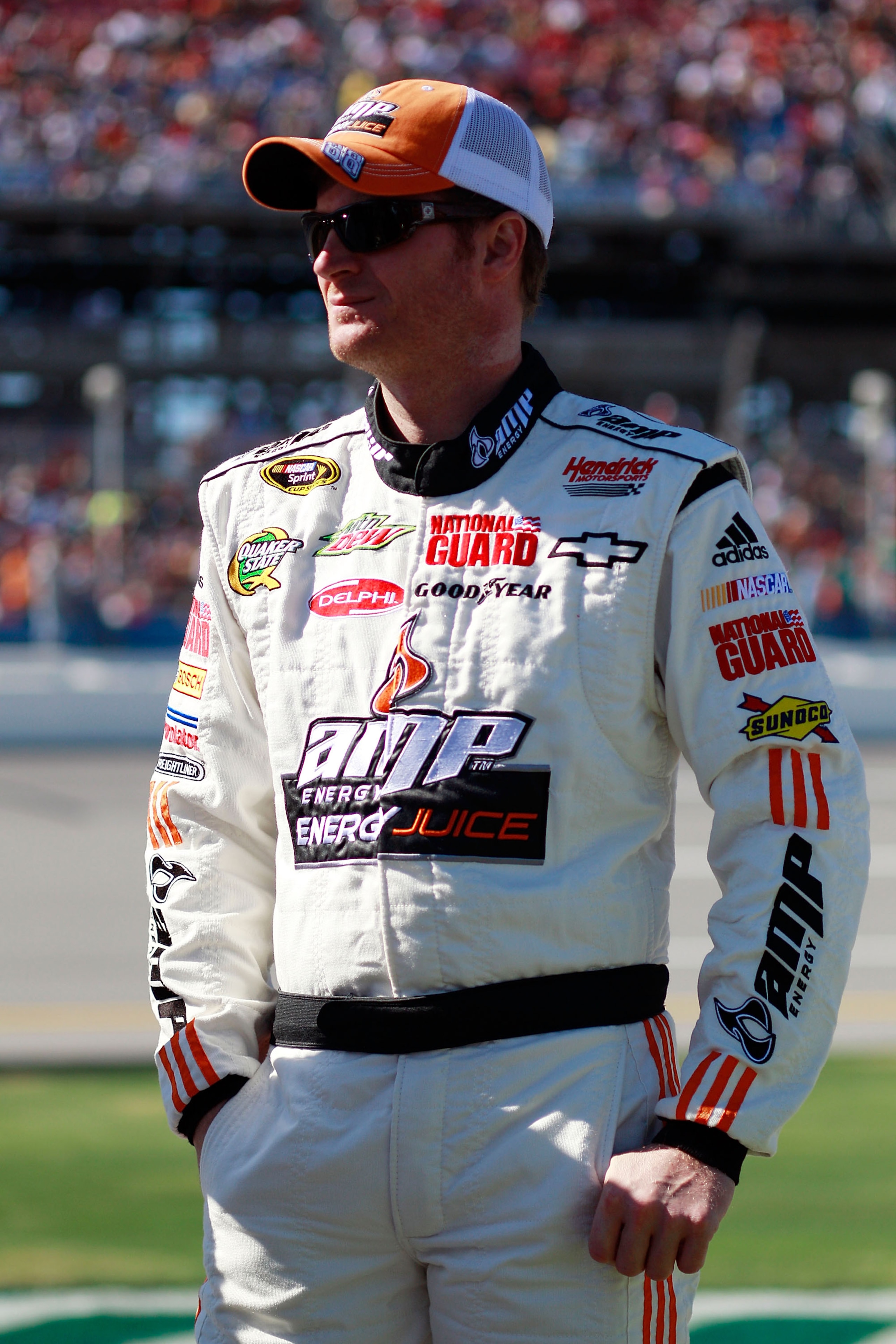 TALLADEGA, AL - OCTOBER 31: Dale Earnhardt Jr., driver of the #88 Amp Energy Juice/National Guard Chevrolet, stands on pit road before the NASCAR Sprint Cup Series AMP Energy Juice 500 at Talladega Superspeedway on October 31, 2010 in Talladega, Alabama. TALLADEGA, AL - OCTOBER 31: Dale Earnhardt Jr., driver of the #88 Amp Energy Juice/National Guard Chevrolet, stands on pit road before the NASCAR Sprint Cup Series AMP Energy Juice 500 at Talladega Superspeedway on October 31, 2010 in Talladega, Alabama.