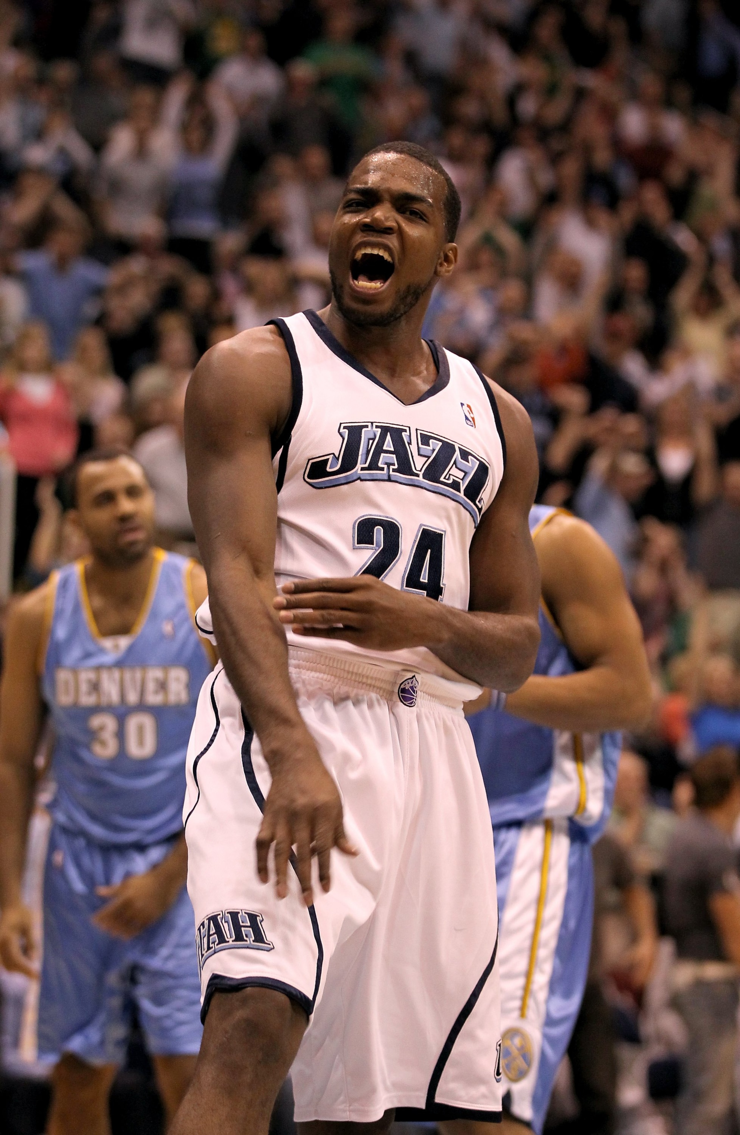 SALT LAKE CITY - APRIL 30: Paul Millsap #24 of the Utah Jazz celebrates after making a dunk during their game against the Denver Nuggets during Game Six of the Western Conference Quarterfinals of the 2010 NBA Playoffs at EnergySolutions Arena on April 30 SALT LAKE CITY - APRIL 30: Paul Millsap #24 of the Utah Jazz celebrates after making a dunk during their game against the Denver Nuggets during Game Six of the Western Conference Quarterfinals of the 2010 NBA Playoffs at EnergySolutions Arena on April 30