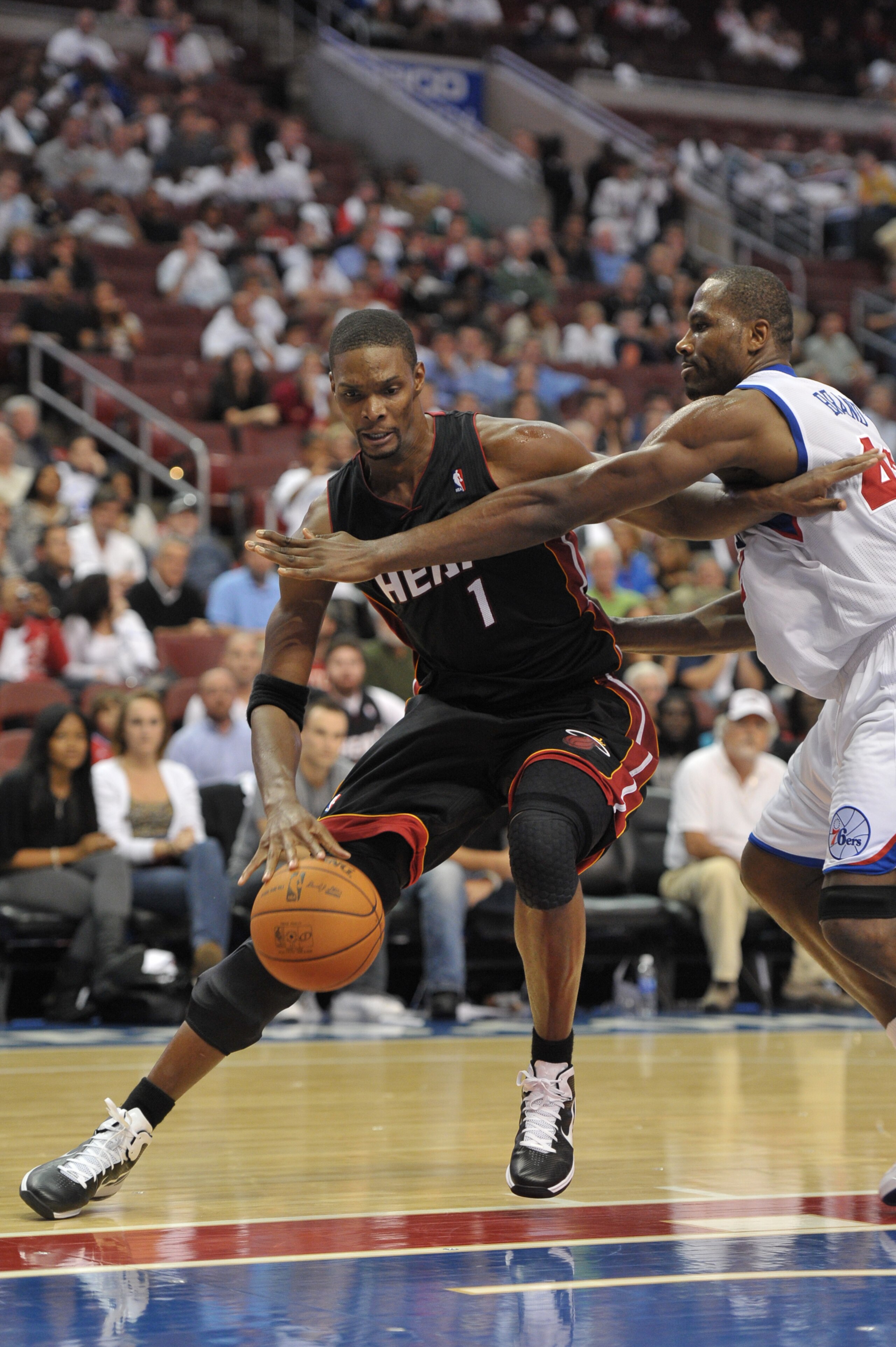 PHILADELPHIA - OCTOBER 27: Chris Bosh #1 of the Miami Heat in action during the game against the Philadelphia 76ers at the Wells Fargo Center on October 27, 2010 in Philadelphia, Pennsylvania. NOTE TO USER: User expressly acknowledges and agrees that, by PHILADELPHIA - OCTOBER 27: Chris Bosh #1 of the Miami Heat in action during the game against the Philadelphia 76ers at the Wells Fargo Center on October 27, 2010 in Philadelphia, Pennsylvania. NOTE TO USER: User expressly acknowledges and agrees that, by