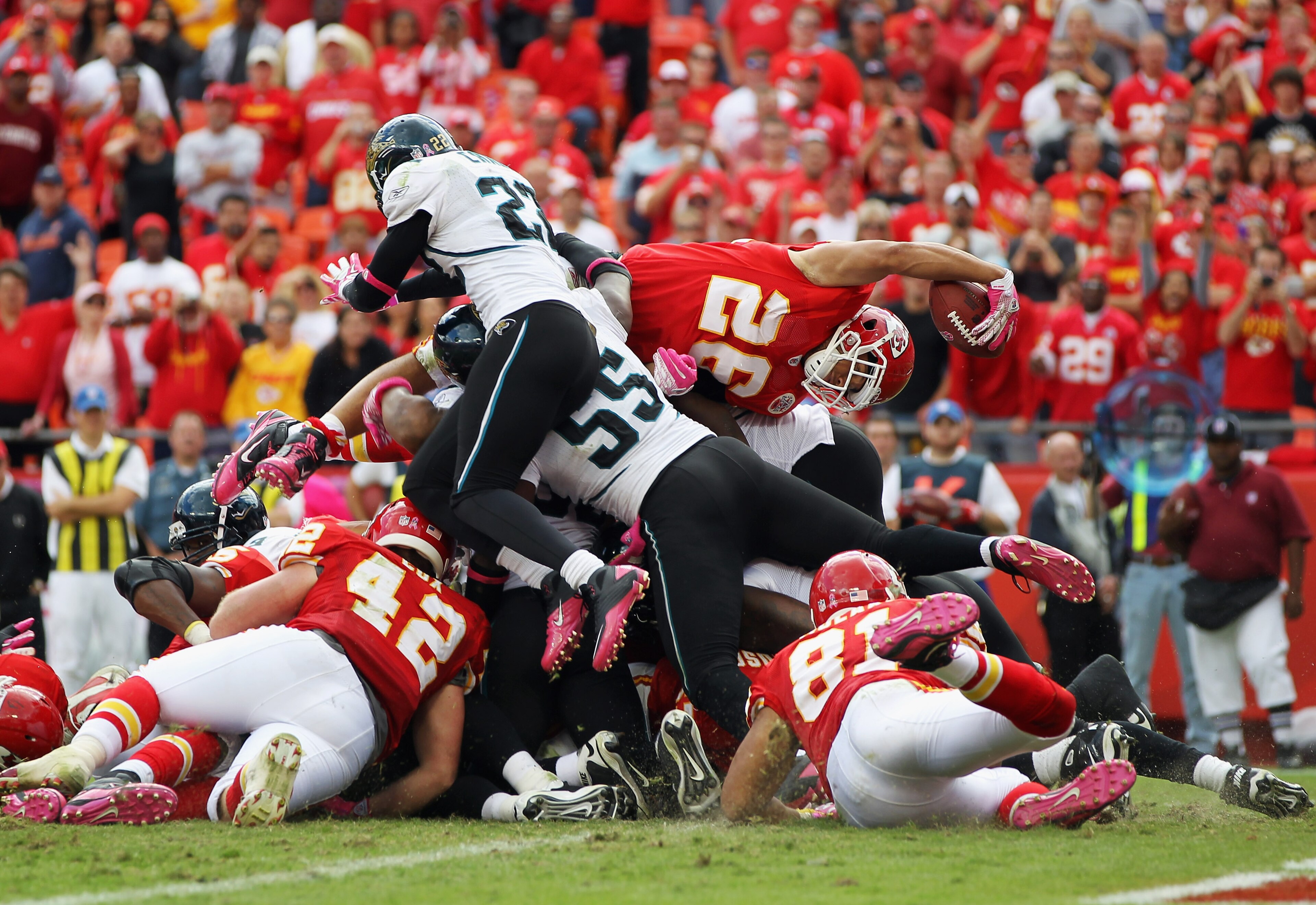 KANSAS CITY, MO - OCTOBER 24: Running back Jackie Battle #26 of the Kansas City Chiefs carries the ball over the top of the defense to score a touchdown during the game against the Jacksonville Jaguars on October 24, 2010 at Arrowhead Stadium in Kansas C KANSAS CITY, MO - OCTOBER 24: Running back Jackie Battle #26 of the Kansas City Chiefs carries the ball over the top of the defense to score a touchdown during the game against the Jacksonville Jaguars on October 24, 2010 at Arrowhead Stadium in Kansas C