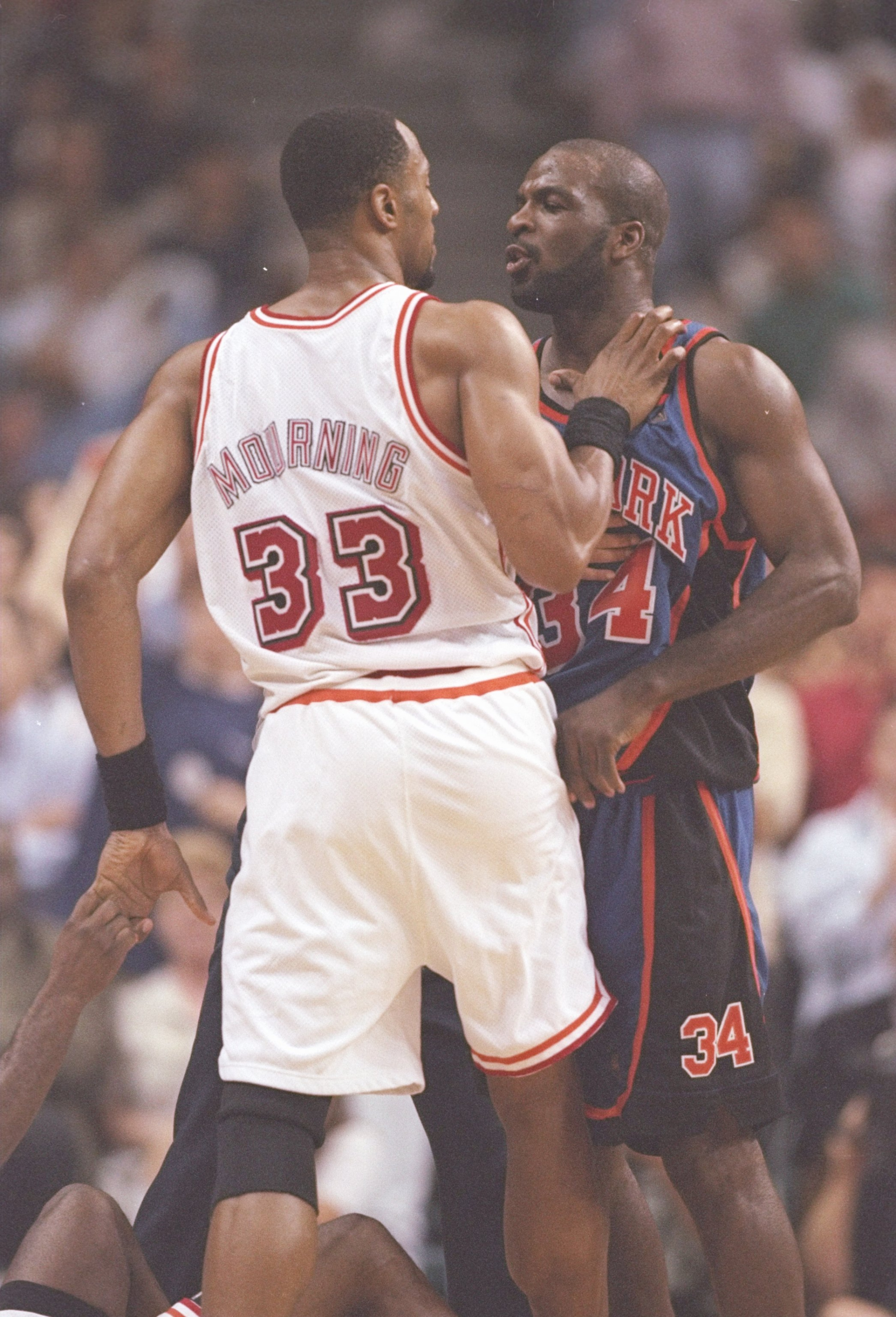 14 May 1997:  Center Alonzo Mourning of the Miami Heat dribbles and forward Charles Oakley of the New York Knicks push each other during a playoff game at the Miami Arena in Miami, Florida.  The Heat won the game 96-81. Mandatory Credit: Andy Lyons  /Alls