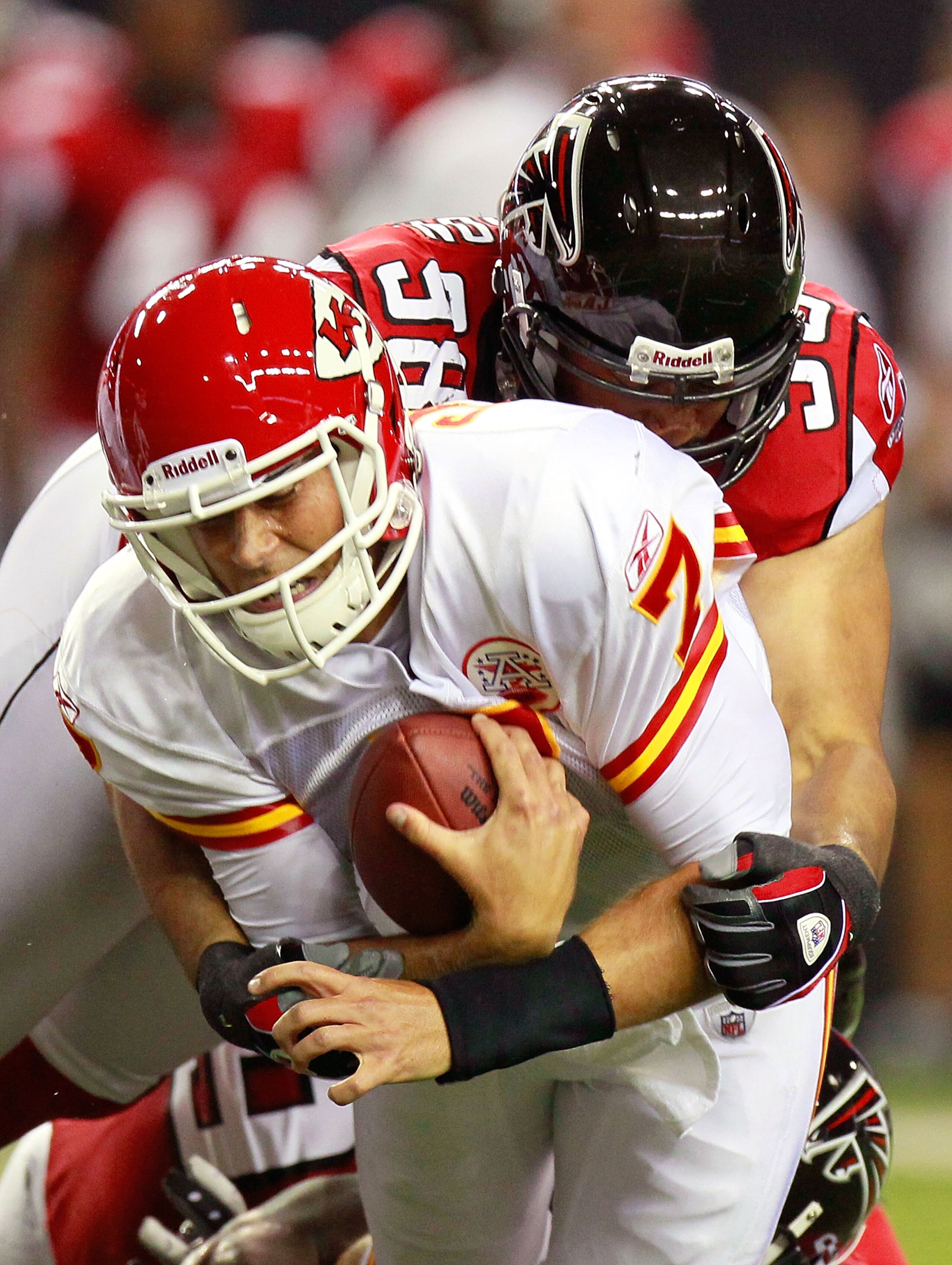 ATLANTA - AUGUST 13:  Jamaal Anderson #98 of the Atlanta Falcons sacks quarterback Matt Cassel #7 of the Kansas City Chiefs at Georgia Dome on August 13, 2010 in Atlanta, Georgia.  (Photo by Kevin C. Cox/Getty Images)