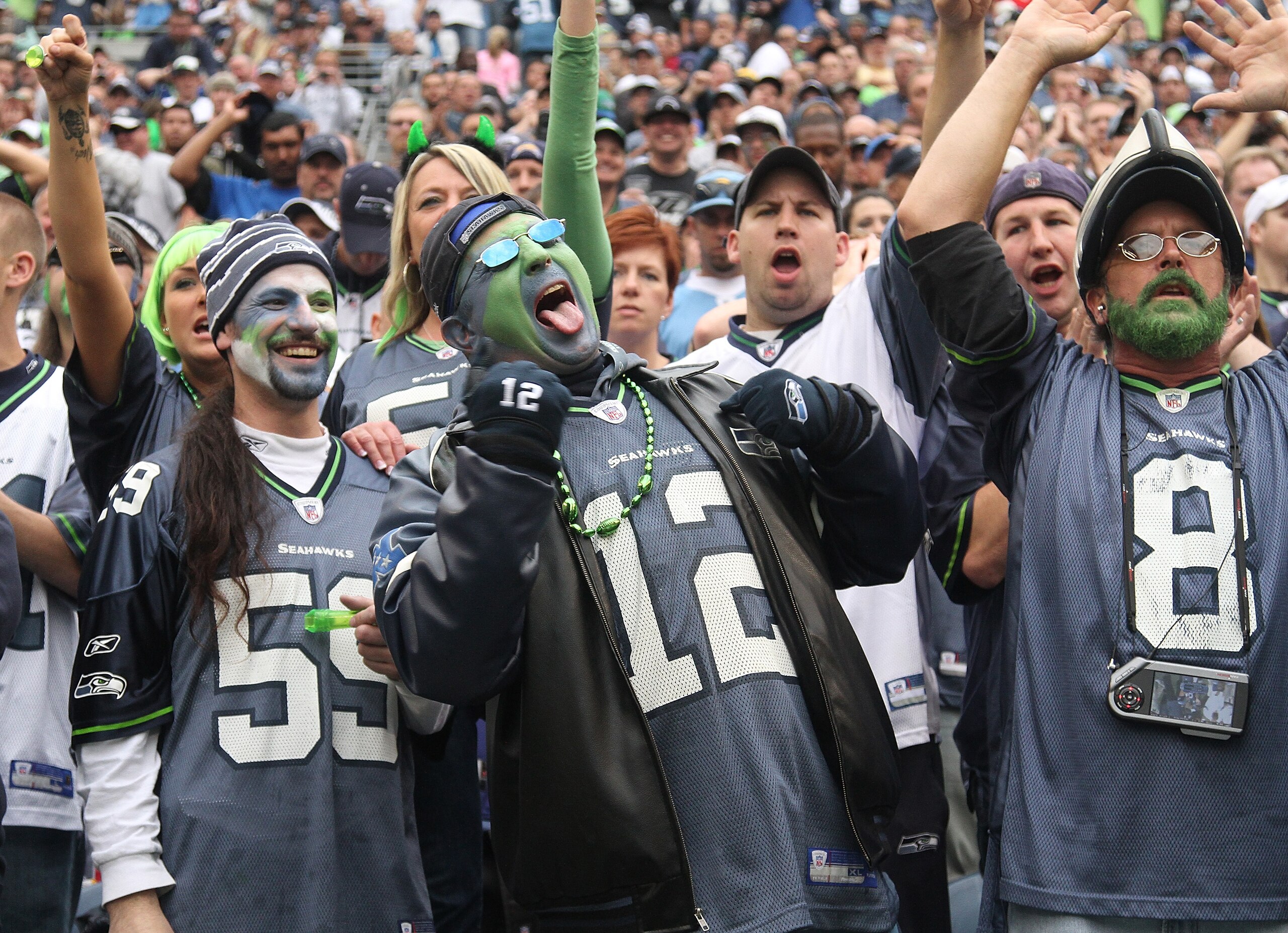 SEATTLE - SEPTEMBER 26:  Fans of the Seattle Seahawks cheer during the game against the San Diego Chargers at Qwest Field on September 26, 2010 in Seattle, Washington. The Seahawks defeated the Chargers 27-20. (Photo by Otto Greule Jr/Getty Images)