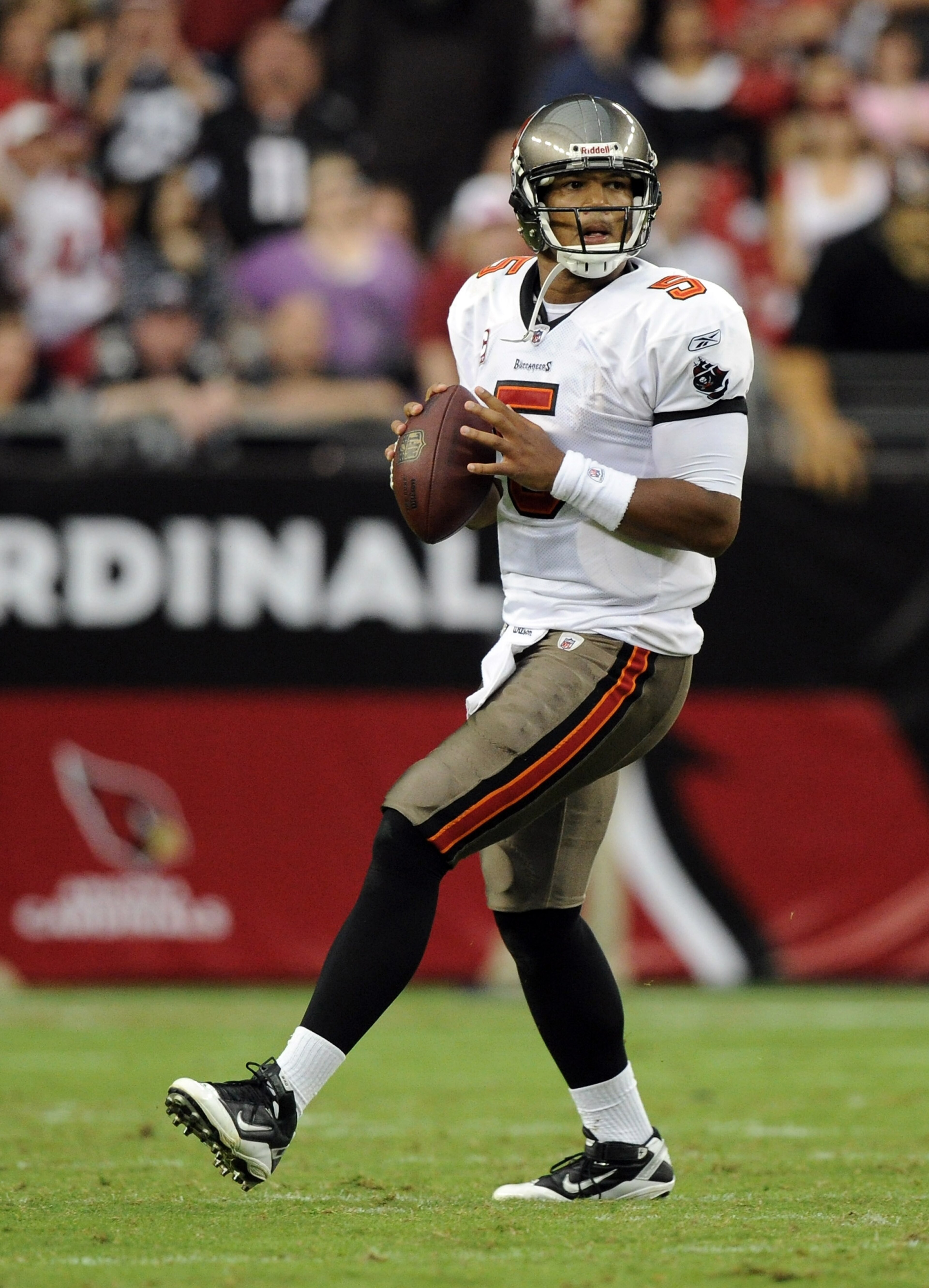 GLENDALE, AZ - OCTOBER 31:  Josh Freeman #5 of the Tampa Bay Buccaneers looks to pass against the Arizona Cardinals at University of Phoenix Stadium on October 31, 2010 in Glendale, Arizona.  (Photo by Harry How/Getty Images)