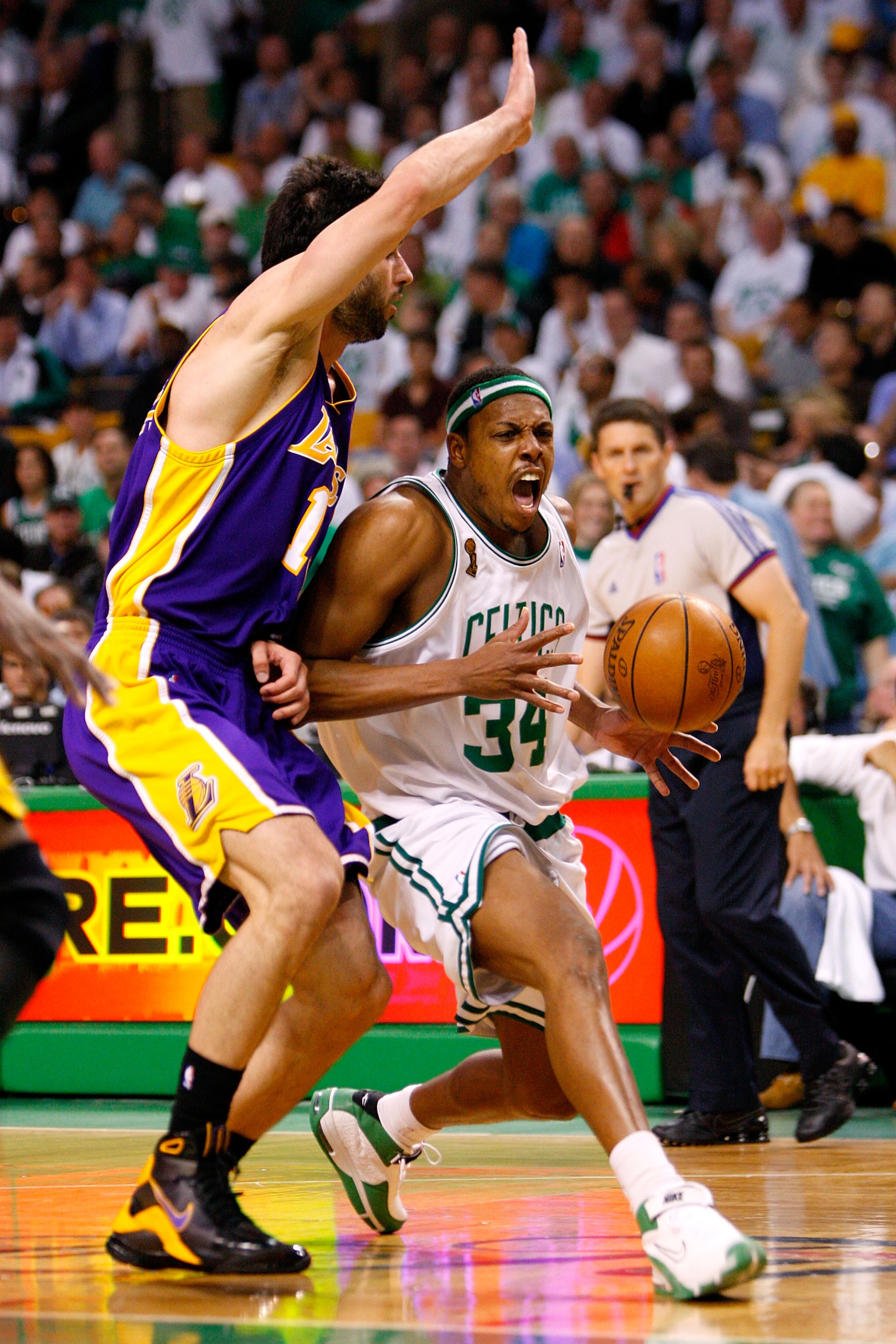BOSTON - JUNE 05:  Paul Pierce #34 of the Boston Celtics drives to the basket against Vladimir Radmanovic #10 of the Los Angeles Lakers in Game One of the 2008 NBA Finals on June 5, 2008 at TD Banknorth Garden in Boston, Massachusetts. NOTE TO USER: User