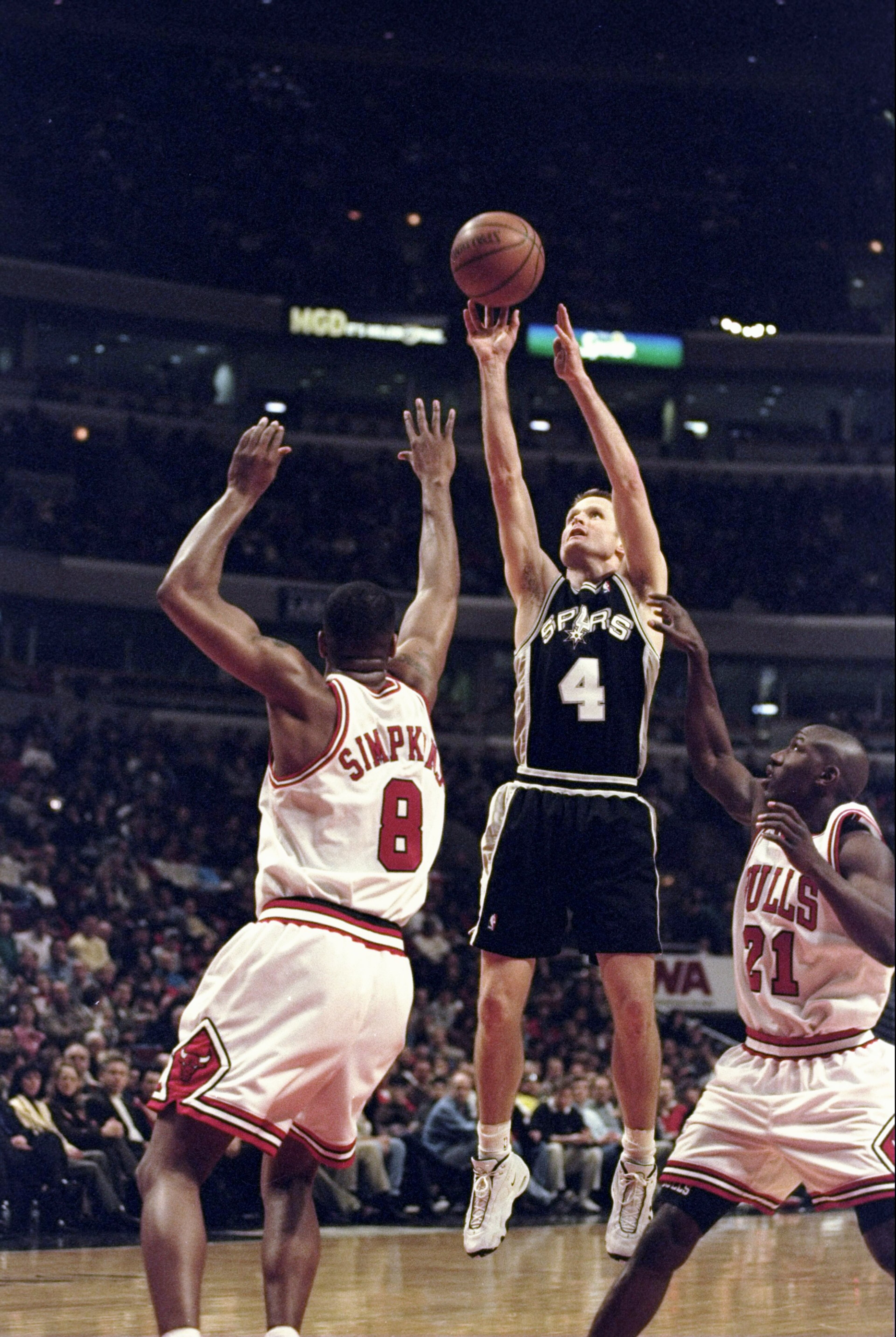 14 Feb 1999:  Steve Kerr #4 of the San Antonio Spurs taking a shot during the game against the Chicago Bulls at the United Center in Chicago, Illinois. The Spurs defeated the Bulls 89-76.  Mandatory Credit: Jonathan Daniel  /Allsport