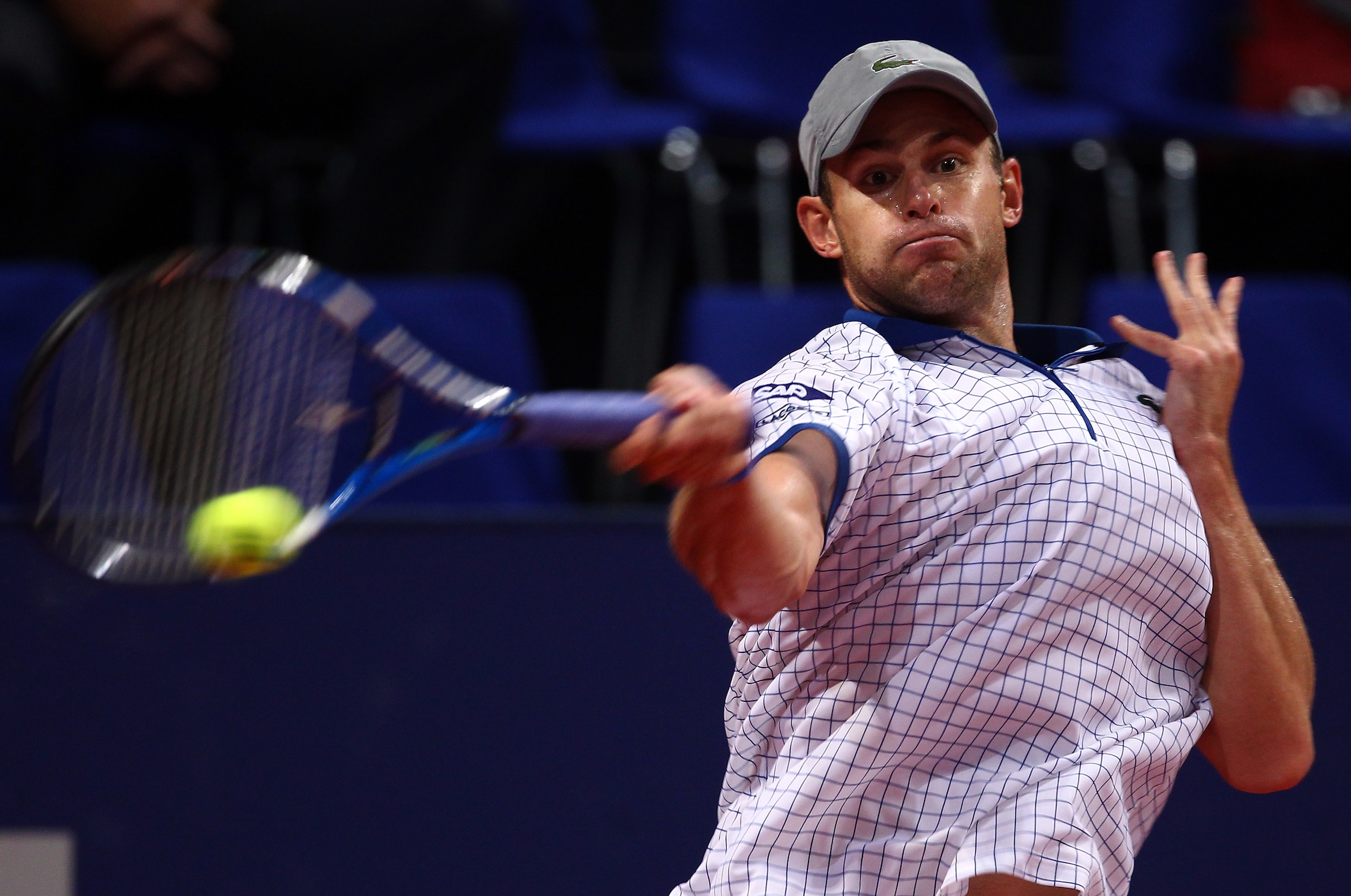 BASEL, SWITZERLAND - NOVEMBER 03:  Andy Roddick of USA plays a forehand in his match against Sam Querrey of USA during Day Three of the Davidoff Swiss Indoors Tennis at St Jakobshalle on November 3, 2010 in Basel, Switzerland.  (Photo by Julian Finney/Get