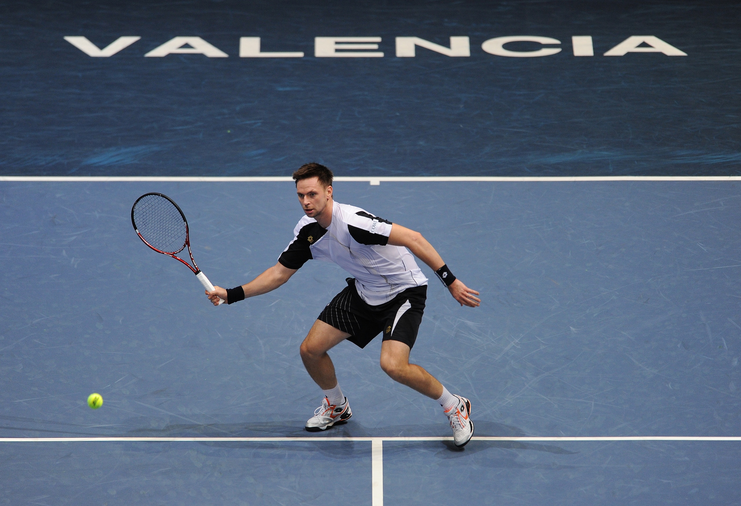 VALENCIA, SPAIN - NOVEMBER 02:  Robin Soderling of Sweden plays a backhand to Albert Montanes of Spain in his first round match during the ATP 500 World Tour Valencia Open tennis tournament at the Ciudad de las Artes y las Ciencias on November 2, 2010 in