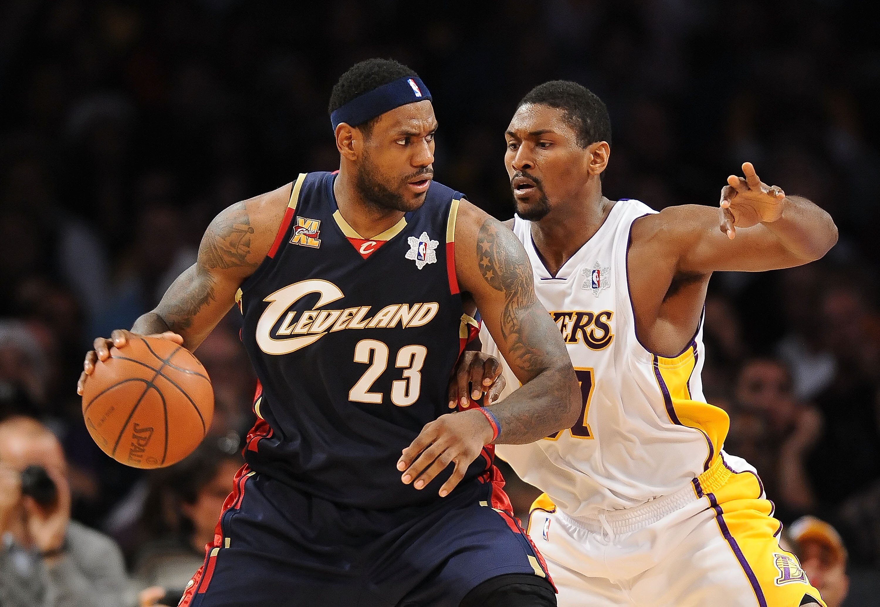 LOS ANGELES, CA - DECEMBER 25:  LeBron James #23 of the Cleveland Cavaliers drives against Ron Artest #37 of the Los Angeles Lakers at Staples Center on December 25, 2009 in Los Angeles, California. NOTE TO USER: User expressly acknowledges and agrees tha