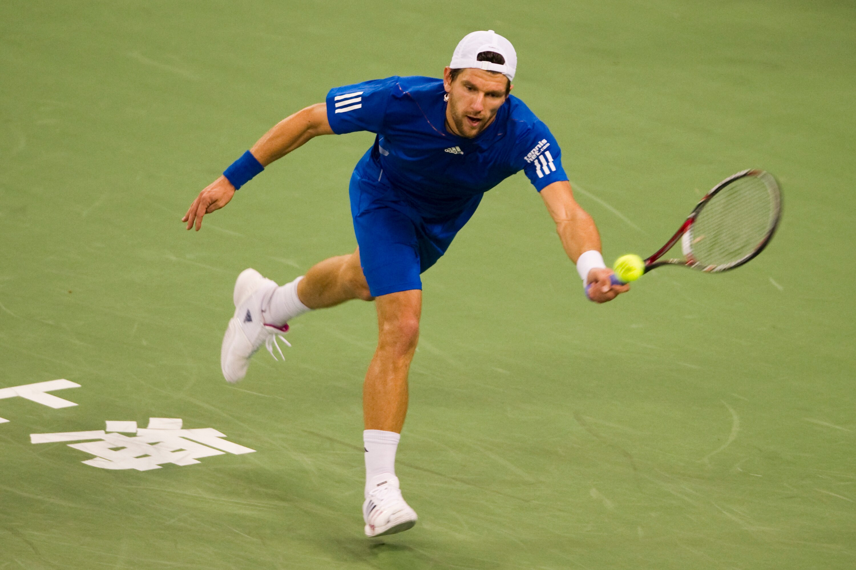 SHANGHAI, CHINA - OCTOBER 15:  Jurgen Melzer of Austria returns a ball to Juan Monaco of Argentina during day five of the 2010 Shanghai Rolex Masters at the Shanghai Qi Zhong Tennis Center on October 15, 2010 in Shanghai, China.  (Photo by Victor Fraile/G