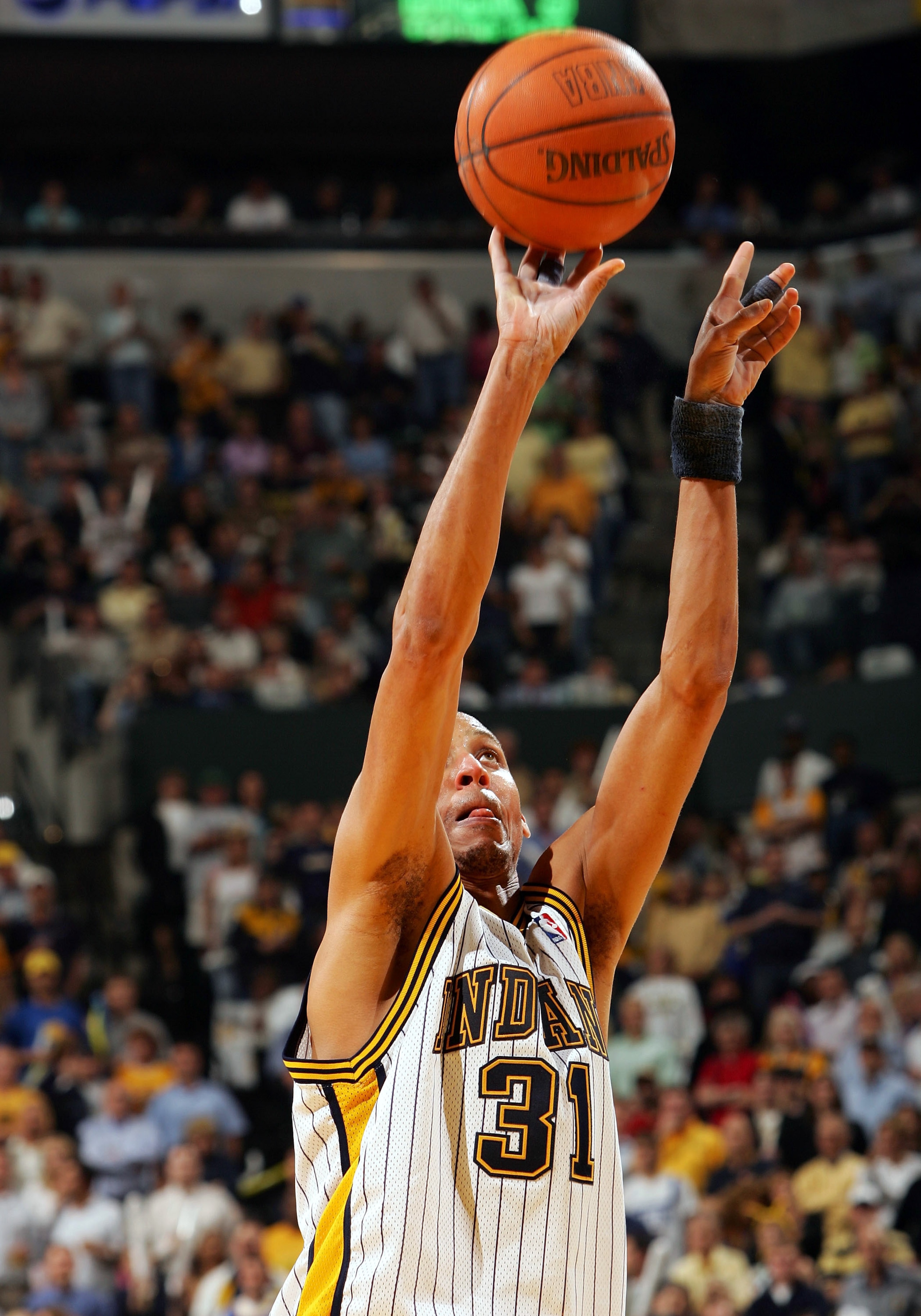 INDIANAPOLIS - MAY 19: Reggie Miller #31 of the Indiana Pacers shoots a free throw in Game six of the Eastern Conference Semifinals during the 2005 NBA Playoffs on May 19, 2005 at Conseco Fieldhouse in Indianapolis, Indiana. The Pistons defeated the Pac INDIANAPOLIS - MAY 19: Reggie Miller #31 of the Indiana Pacers shoots a free throw in Game six of the Eastern Conference Semifinals during the 2005 NBA Playoffs on May 19, 2005 at Conseco Fieldhouse in Indianapolis, Indiana. The Pistons defeated the Pac