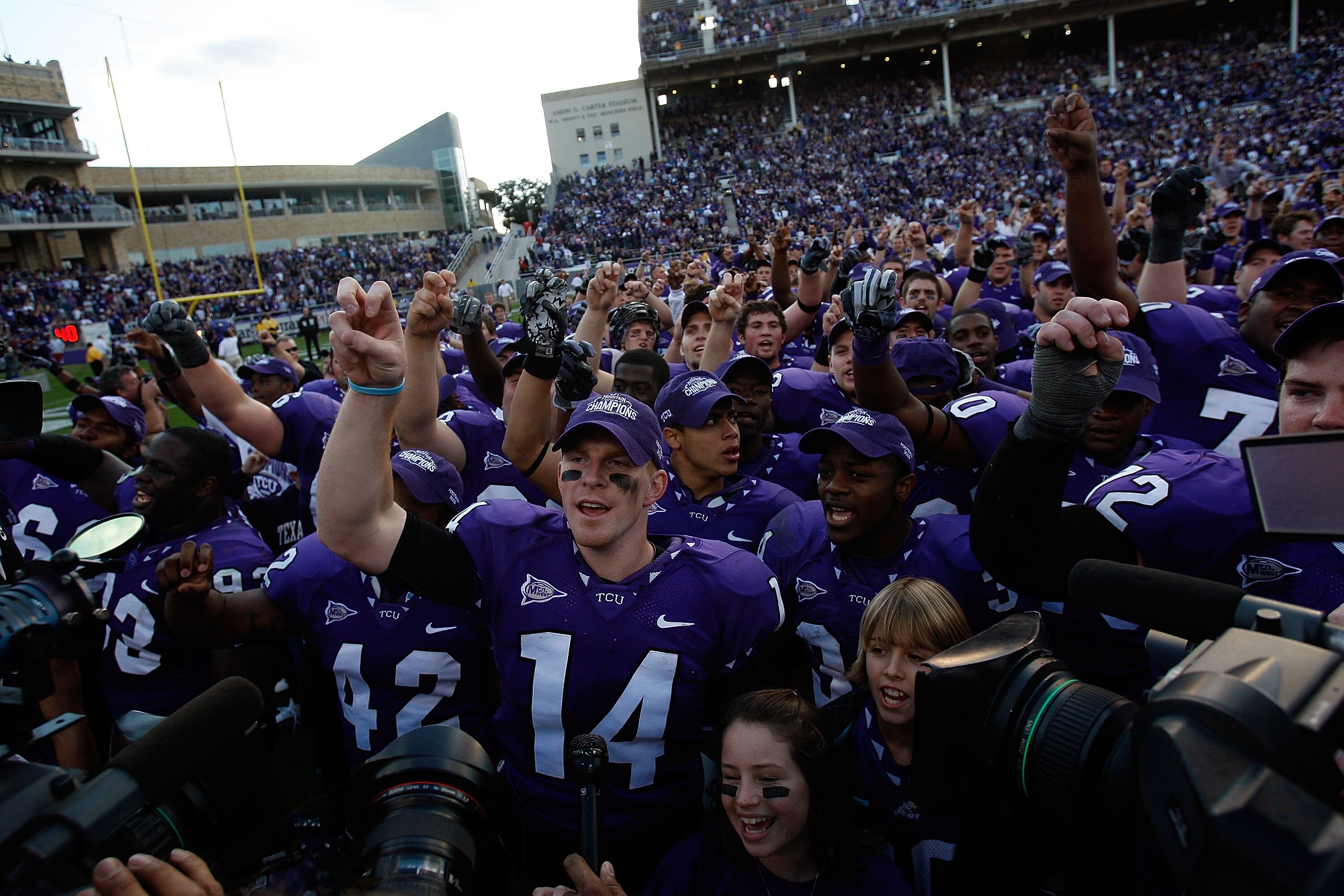 FORT WORTH, TX - NOVEMBER 28:  Quarterback Andy Dalton #14 of the TCU Horned Frogs celebrates a win against the New Mexico Lobos at Amon G. Carter Stadium on November 28, 2009 in Fort Worth, Texas.  (Photo by Ronald Martinez/Getty Images)