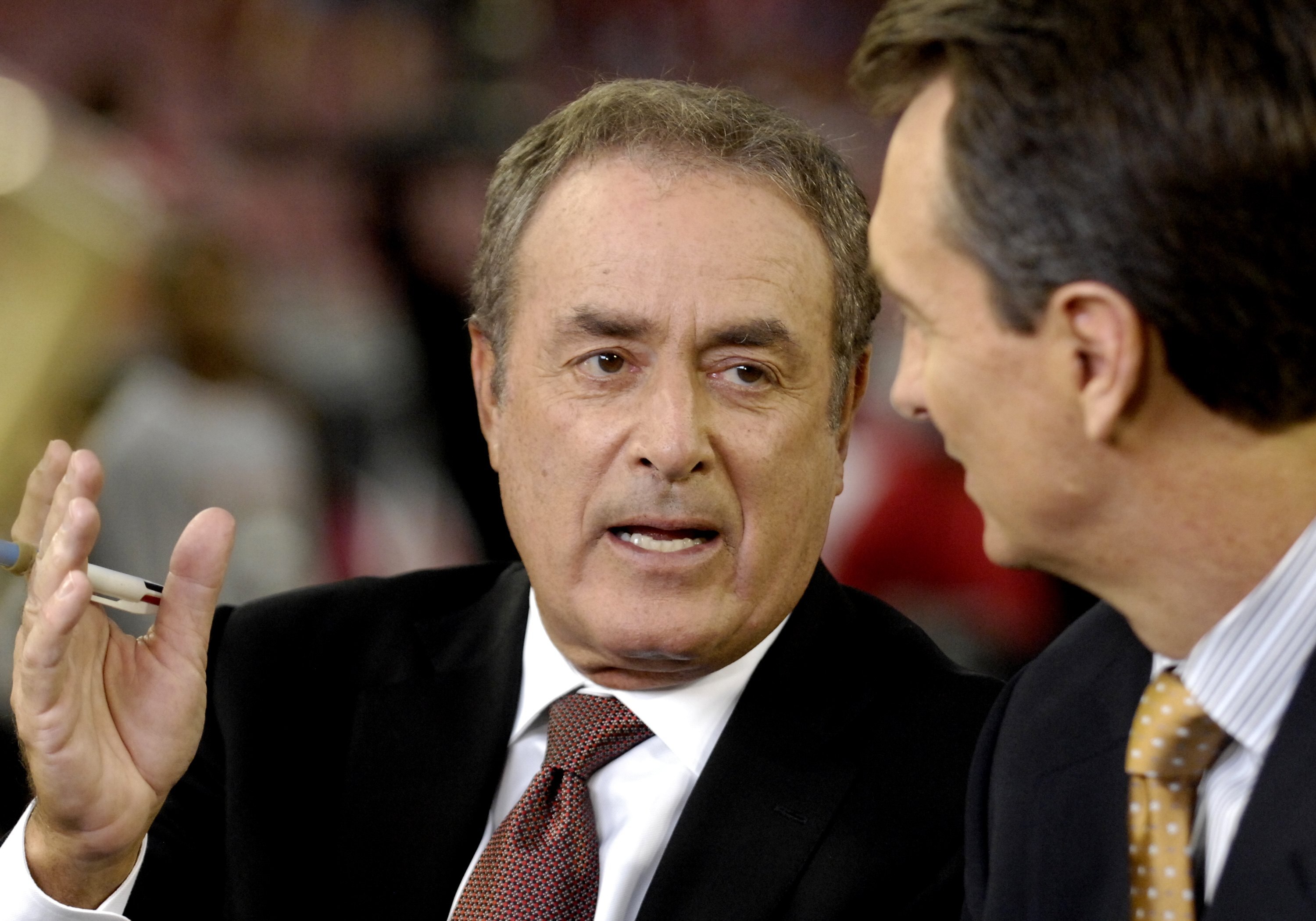TAMPA, FL - OCTOBER 19: NBC commenator Al Michaels reports from the sidelines as the Tampa Bay Buccaneers host the Seattle Seahawks at Raymond James Stadium on October 19, 2008 in Tampa, Florida.  (Photo by Al Messerschmidt/Getty Images)