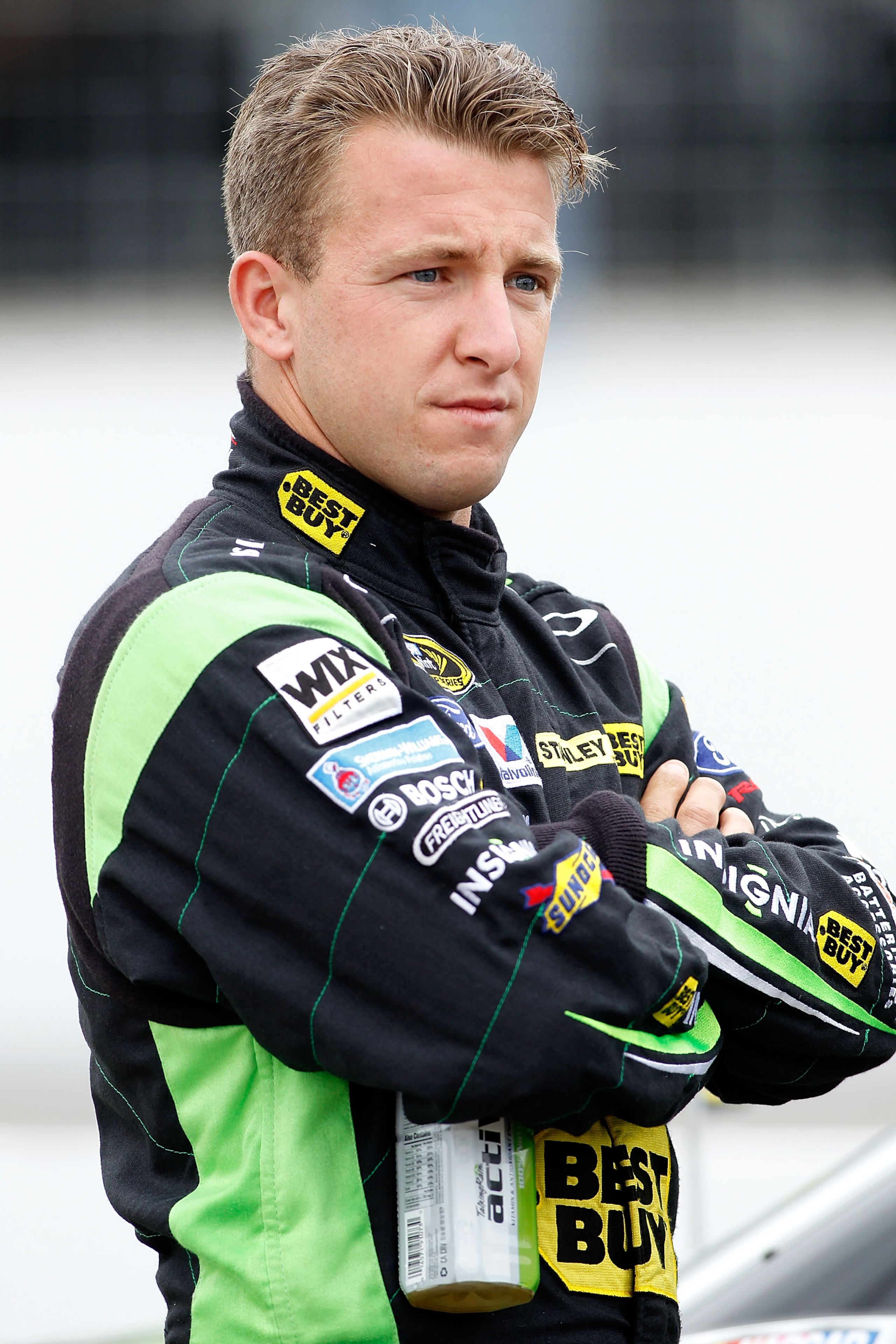 LOUDON, NH - SEPTEMBER 17:  AJ Allmendinger, driver of the #43 Insignia HDTV Ford, looks on during qualifying for the NASCAR Sprint Cup Series Sylvania 300 at New Hampshire Motor Speedway on September 17, 2010 in Loudon, New Hampshire.  (Photo by Todd War