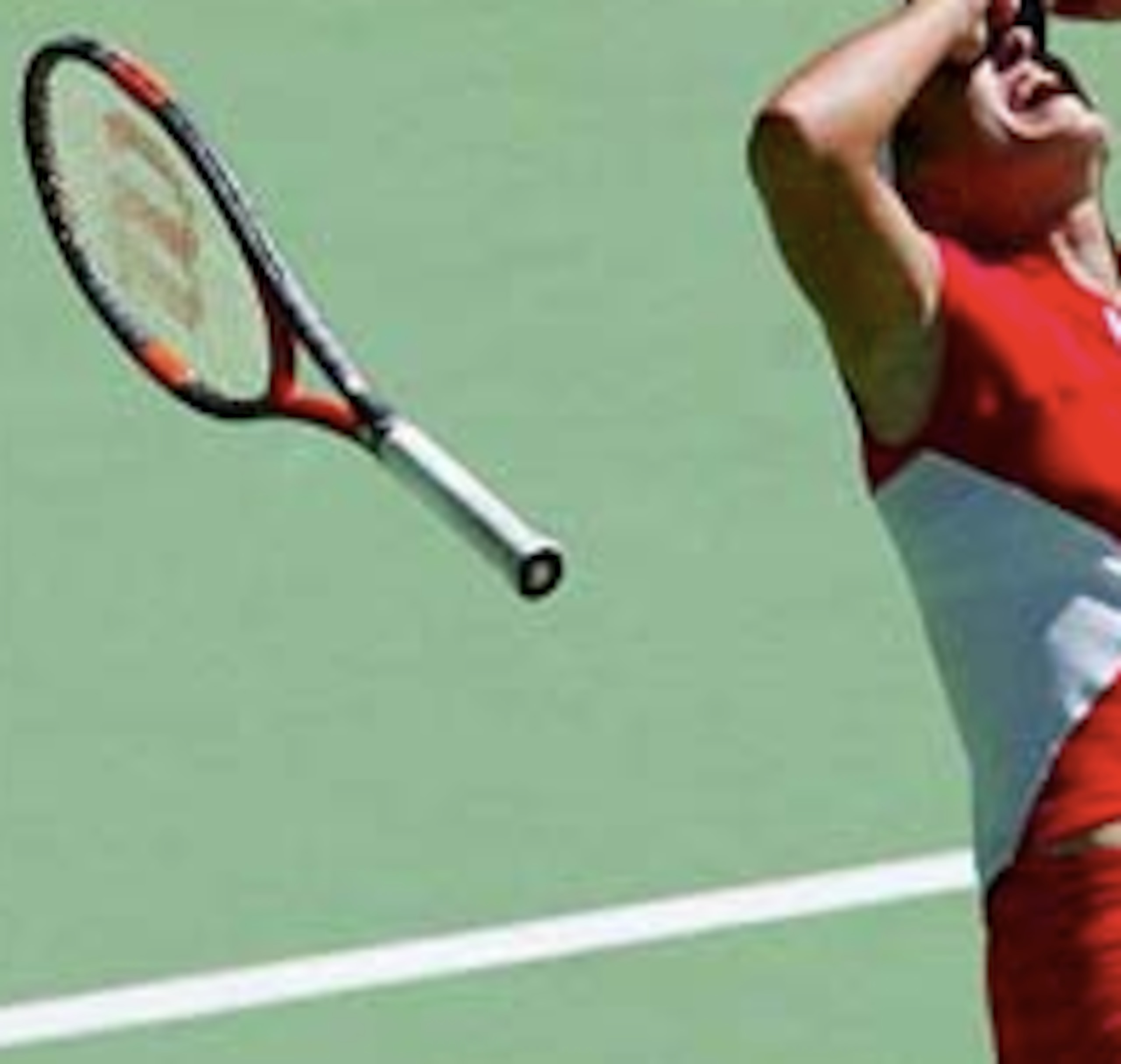 The racket is flung into the air in delight, after a very long and tough match. The racket is flung into the air in delight, after a very long and tough match.