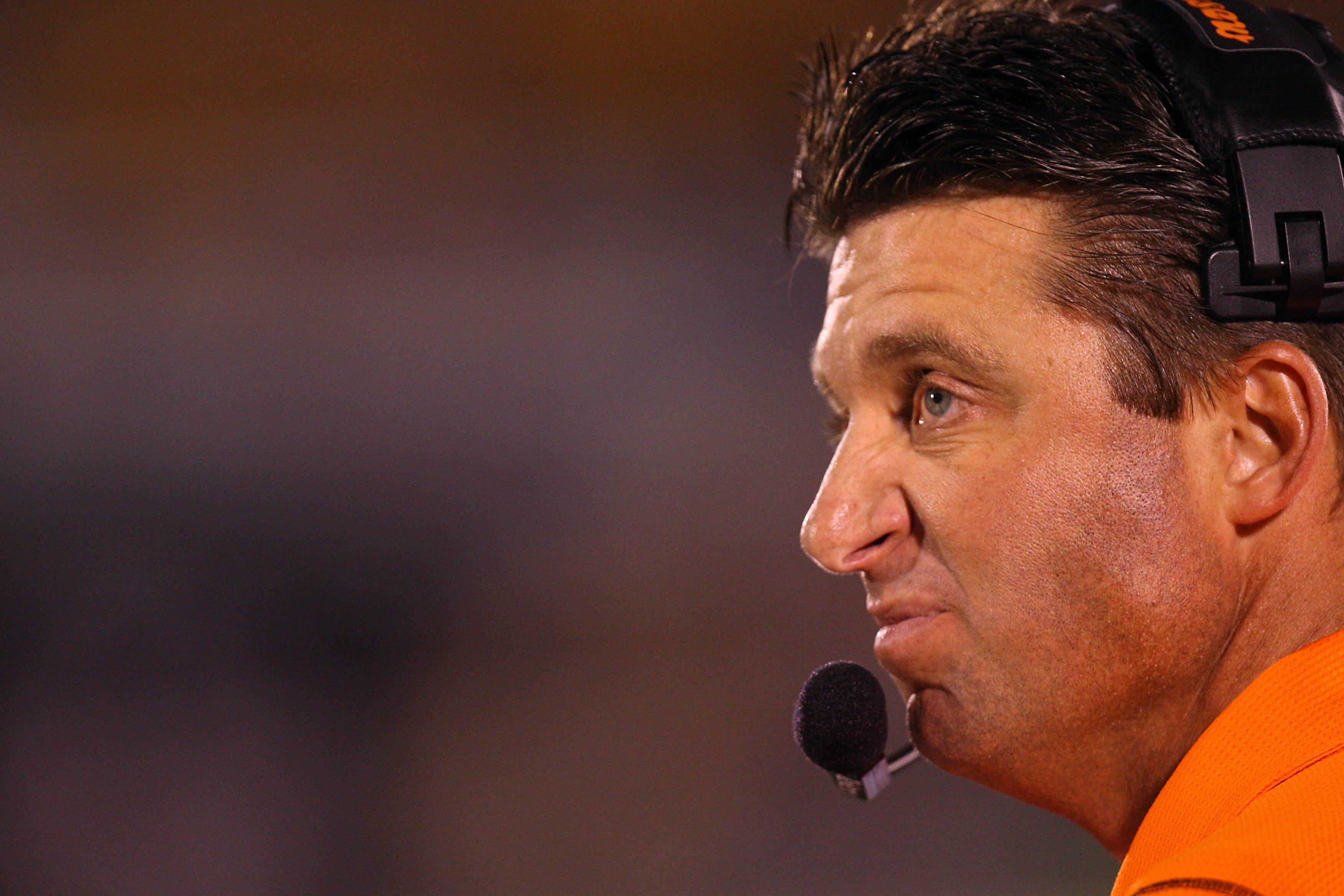 COLUMBIA, MO - OCTOBER 11: Head coach Mike Gundy of the Oklahoma State Cowboys looks on against the Missouri Tigers for yardage on October 11, 2008 at Memorial Stadium in Columbia, Missouri. (Photo by G. Newman Lowrance/Getty Images) COLUMBIA, MO - OCTOBER 11: Head coach Mike Gundy of the Oklahoma State Cowboys looks on against the Missouri Tigers for yardage on October 11, 2008 at Memorial Stadium in Columbia, Missouri. (Photo by G. Newman Lowrance/Getty Images)
