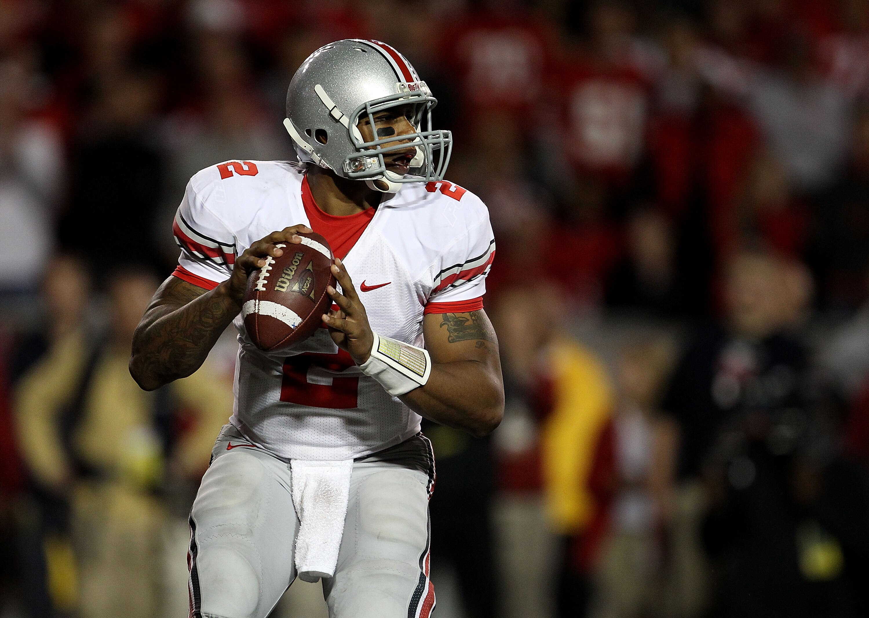 MADISON, WI - OCTOBER 16: Terrelle Pryor #2 of the Ohio State Buckeyes looks for a receiver against the Wisconsin Badgers at Camp Randall Stadium on October 16, 2010 in Madison, Wisconsin. Wisconsin defeated Ohio State 31-18. (Photo by Jonathan Daniel/Get MADISON, WI - OCTOBER 16: Terrelle Pryor #2 of the Ohio State Buckeyes looks for a receiver against the Wisconsin Badgers at Camp Randall Stadium on October 16, 2010 in Madison, Wisconsin. Wisconsin defeated Ohio State 31-18. (Photo by Jonathan Daniel/Get